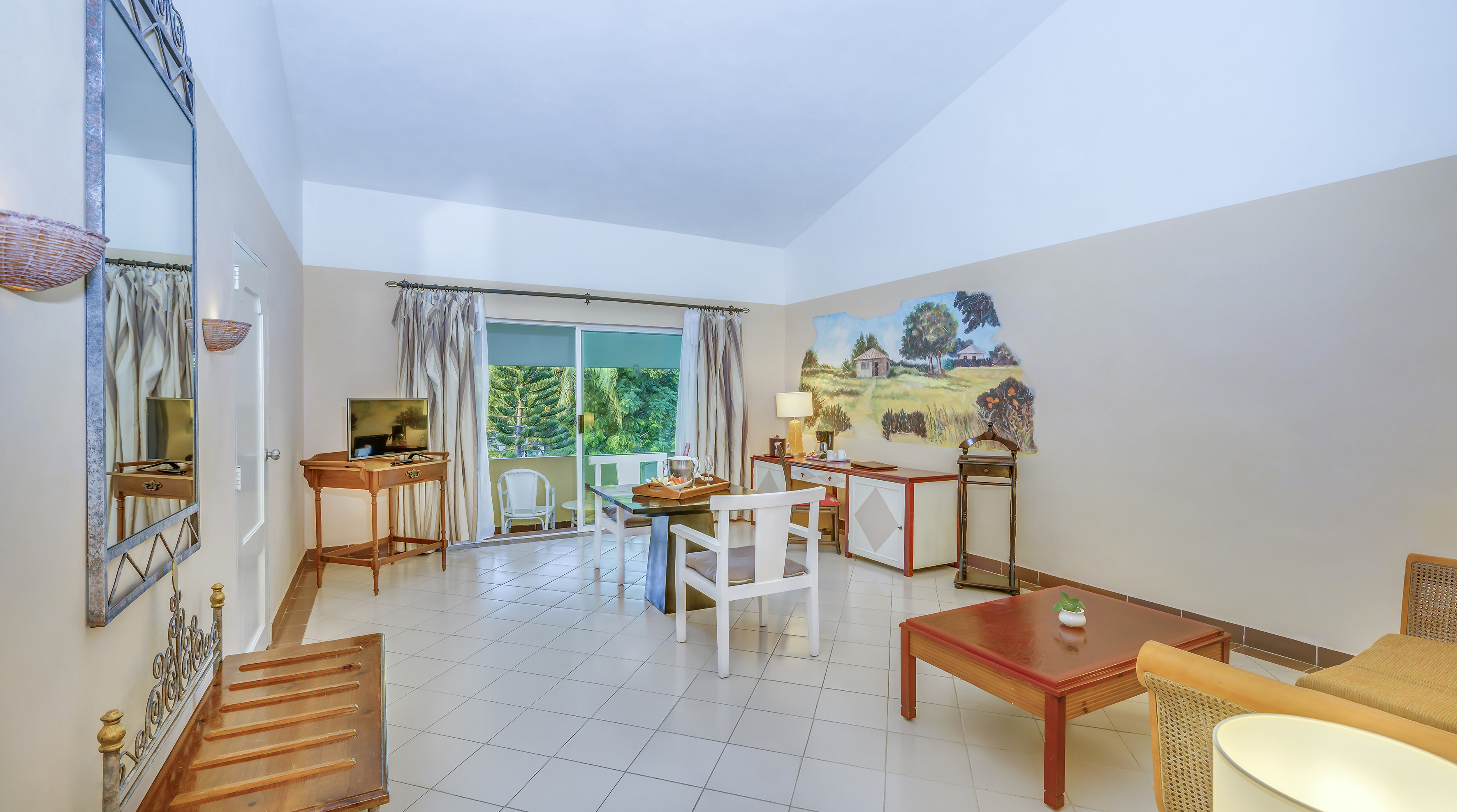 a room with a table and chairs