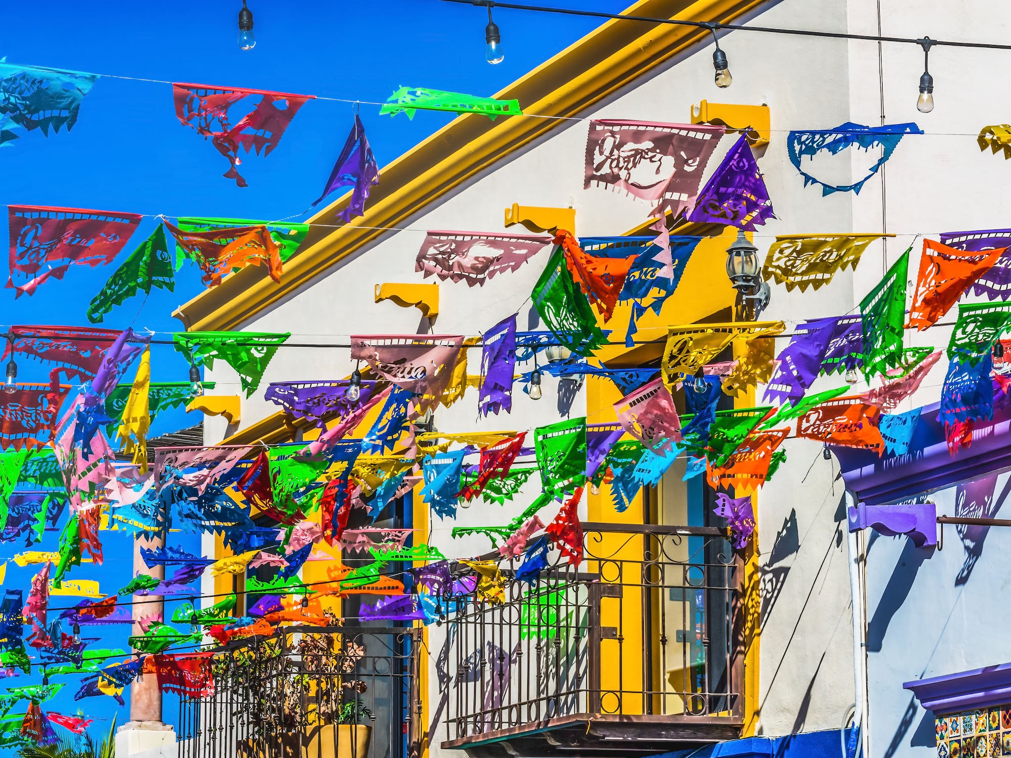 a colorful flags on a building