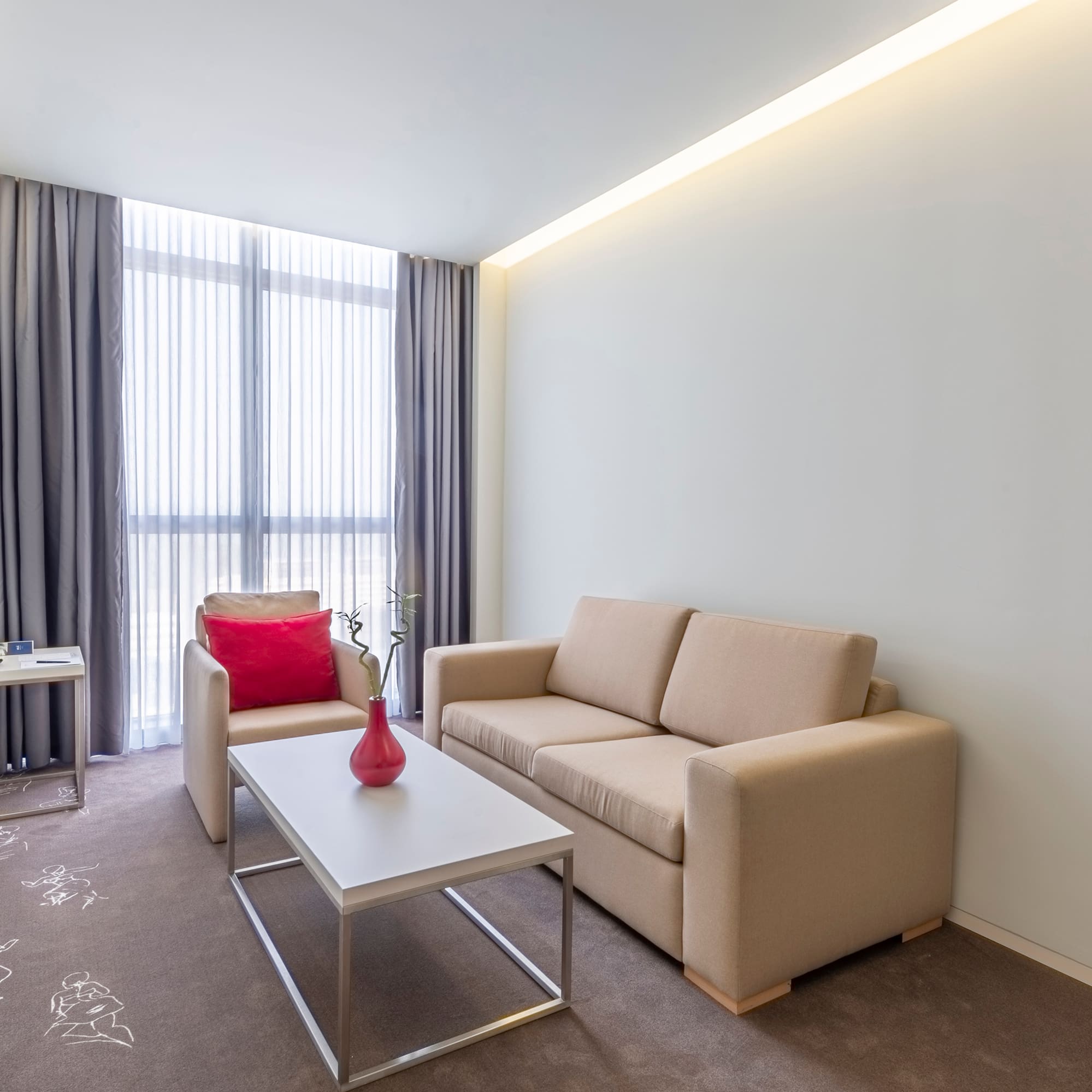 a living room with a couch and a coffee table