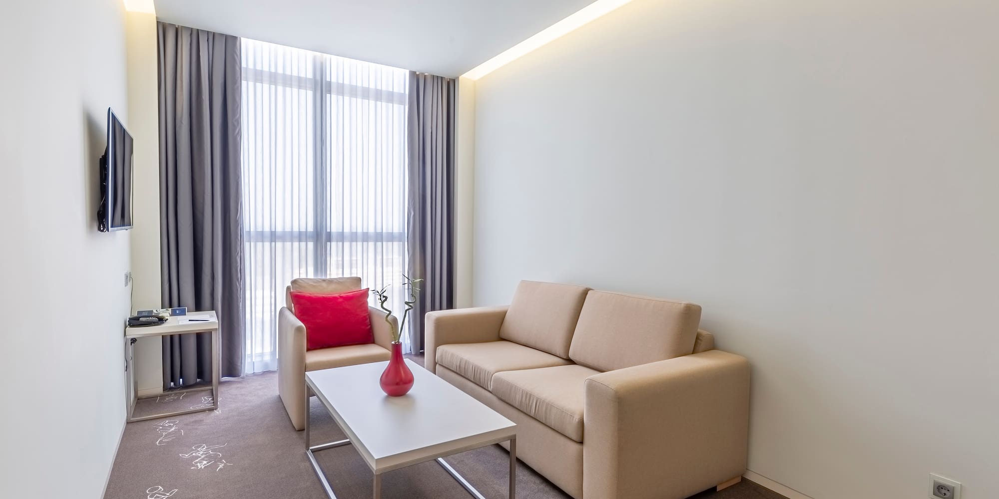 a living room with a couch and a coffee table