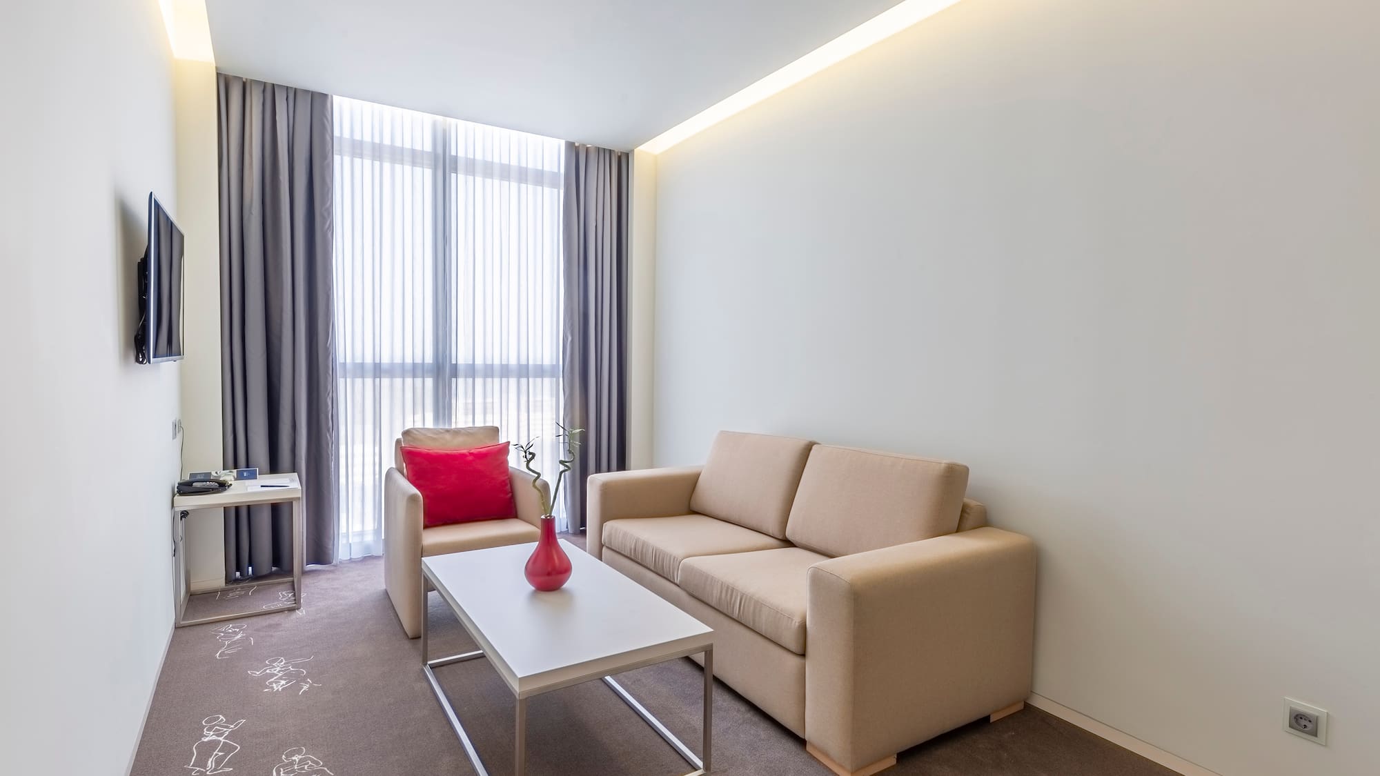 a living room with a couch and a coffee table