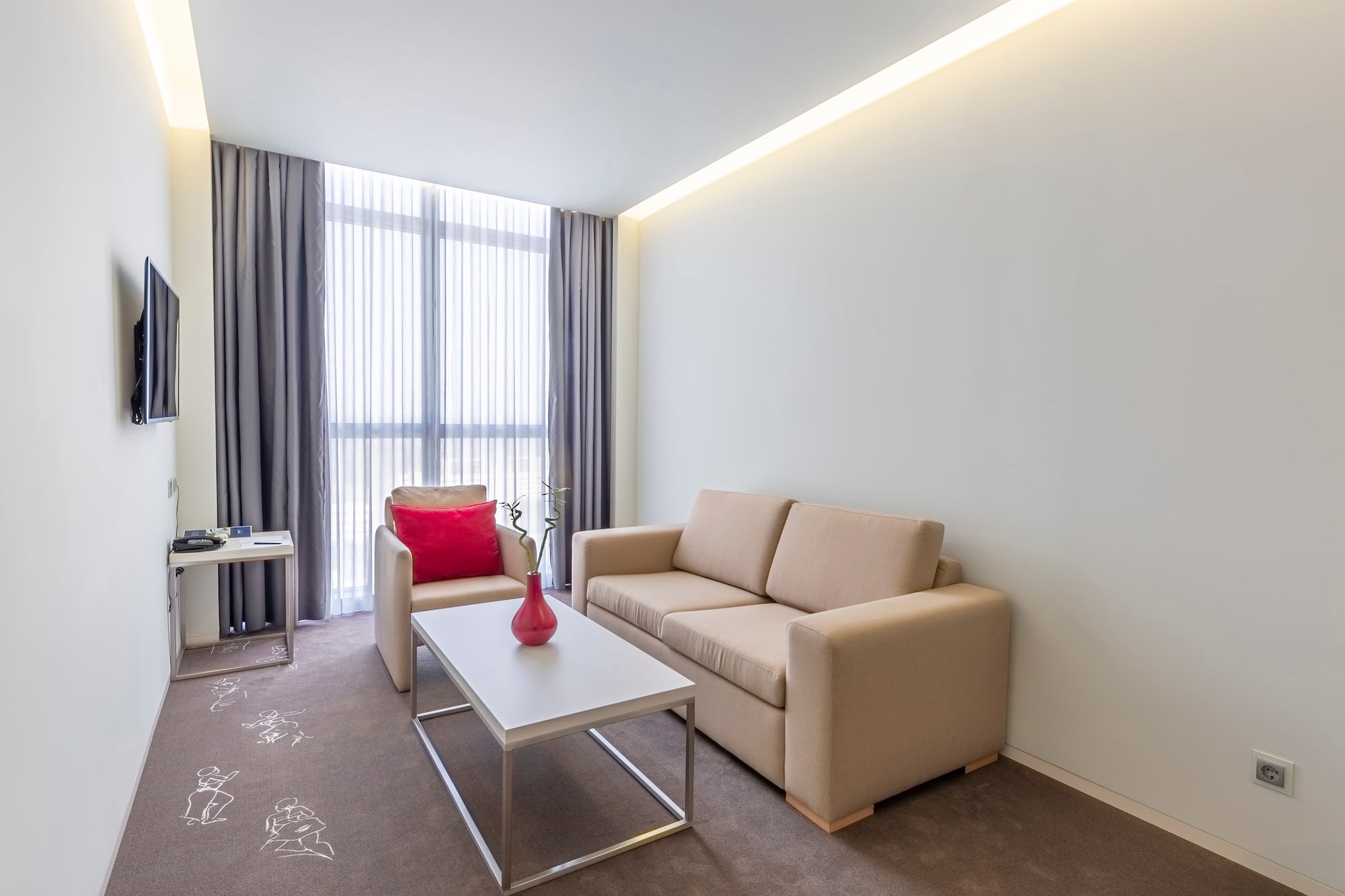 a living room with a couch and a coffee table