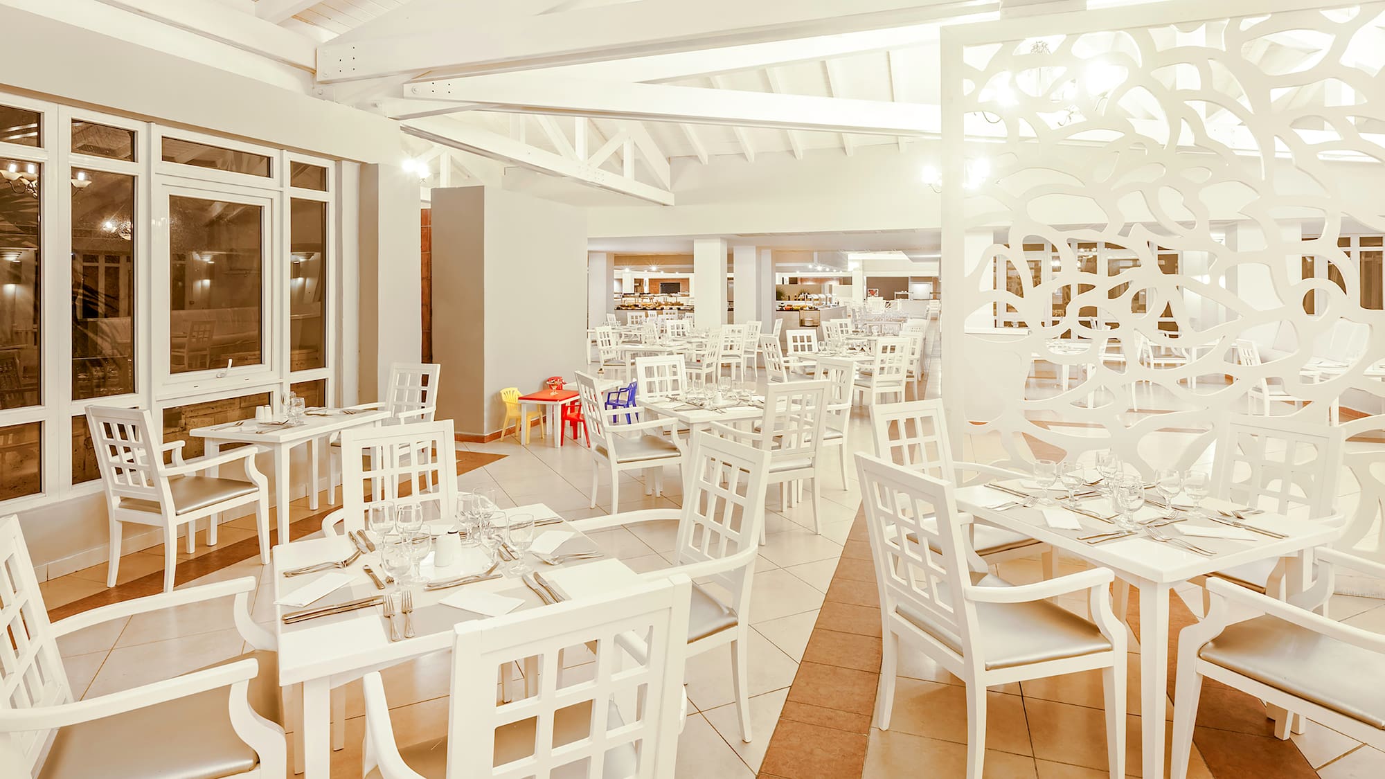 a room with tables and chairs