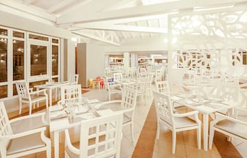 a room with tables and chairs