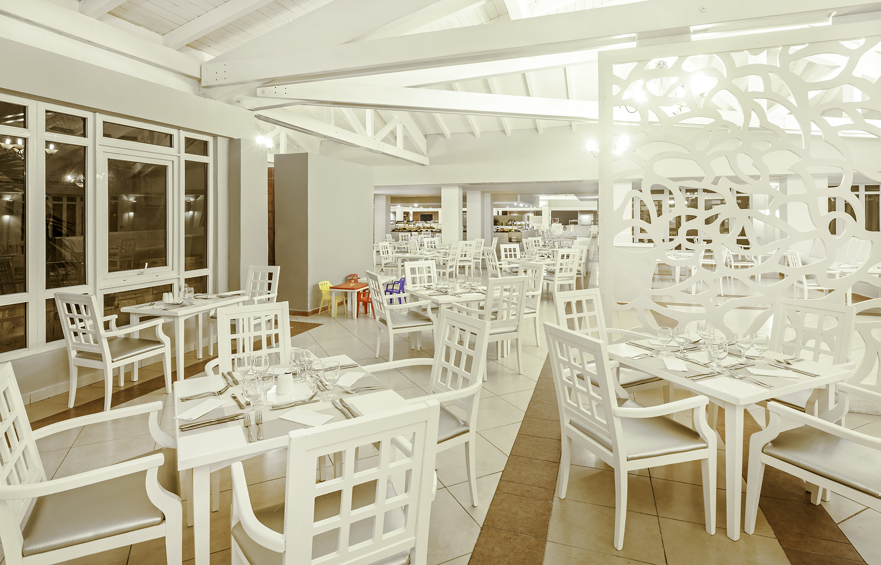 a room with tables and chairs