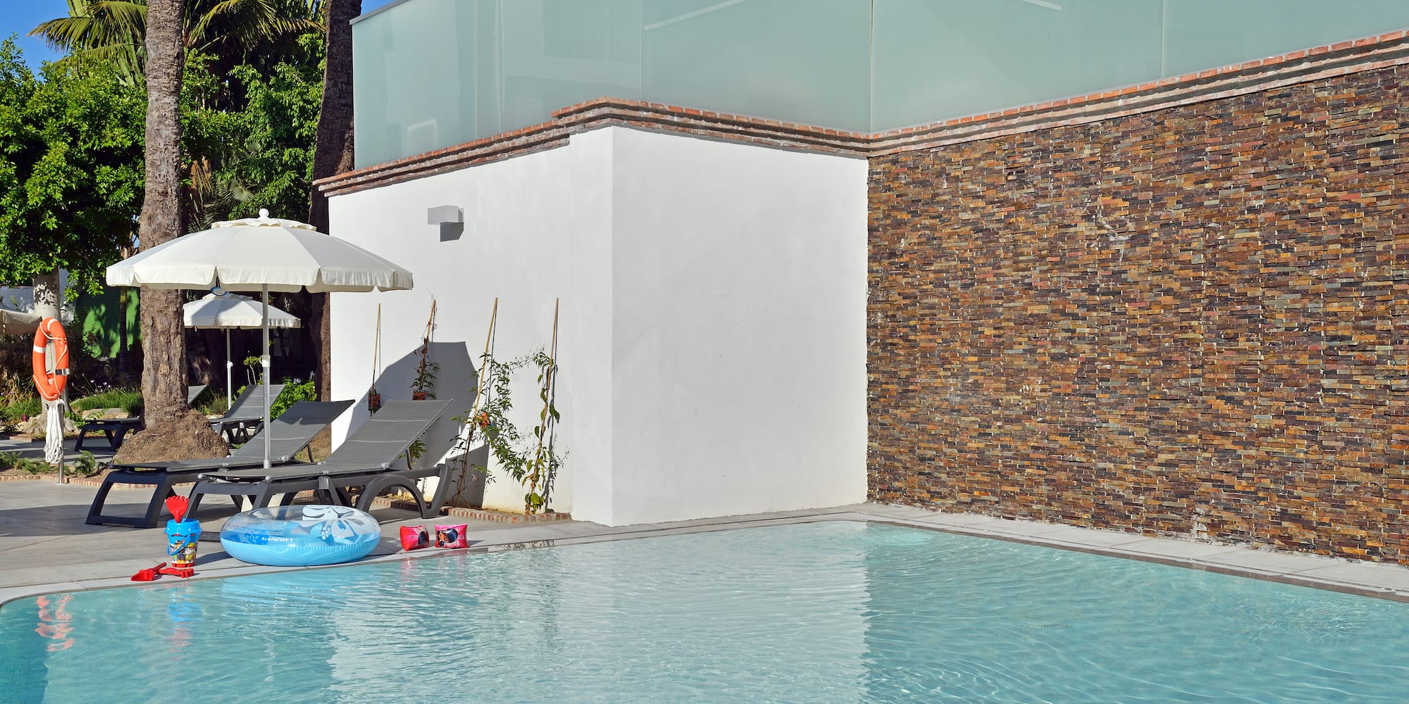 a pool next to a building