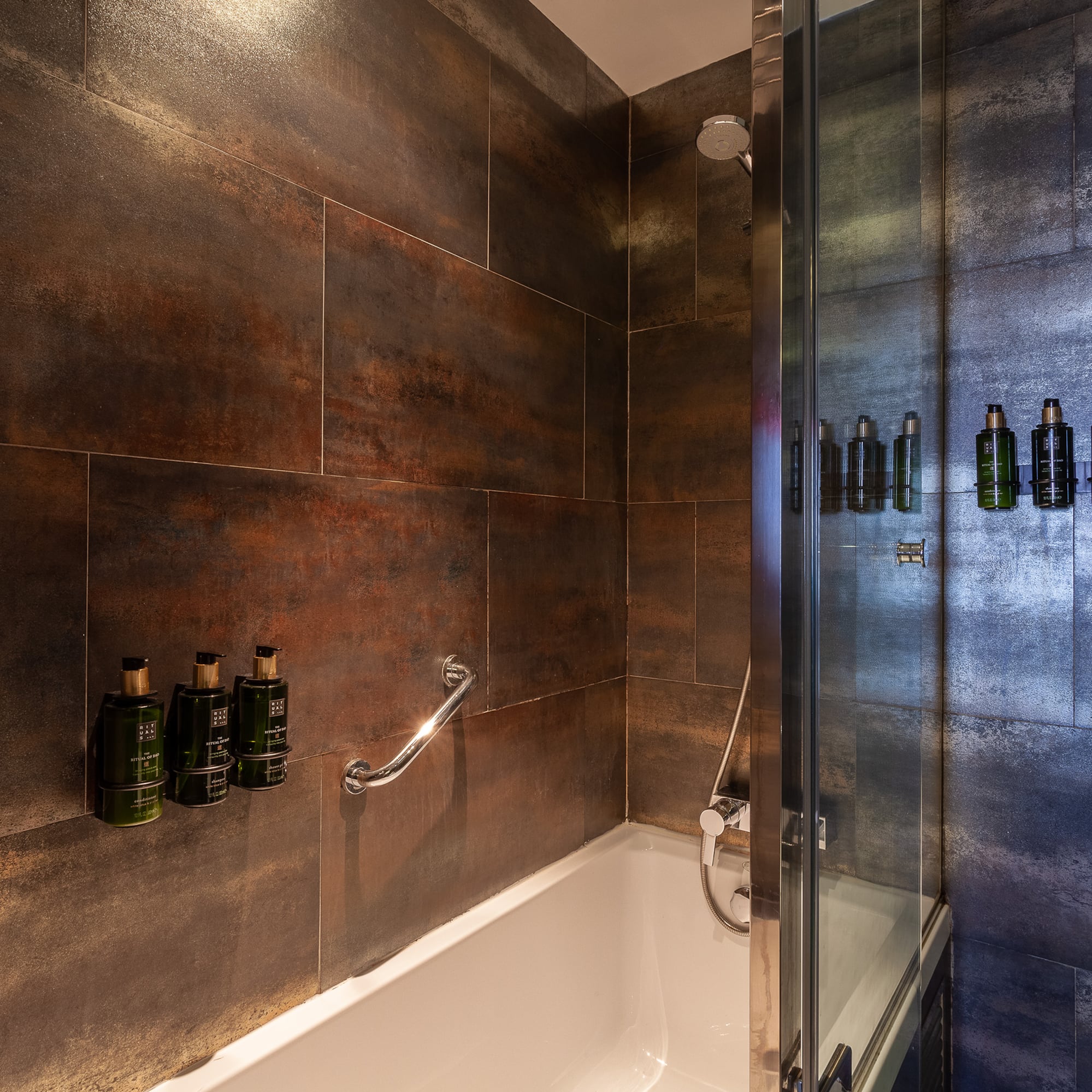 a bathroom with a shower and bathtub