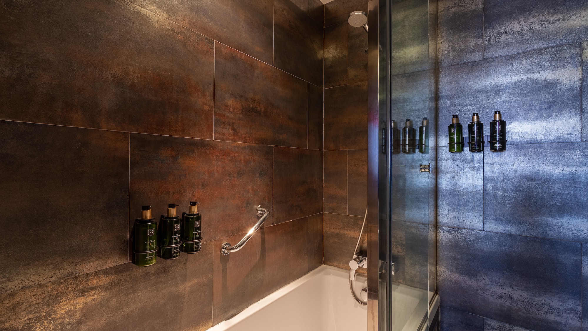 a bathroom with a shower and bathtub