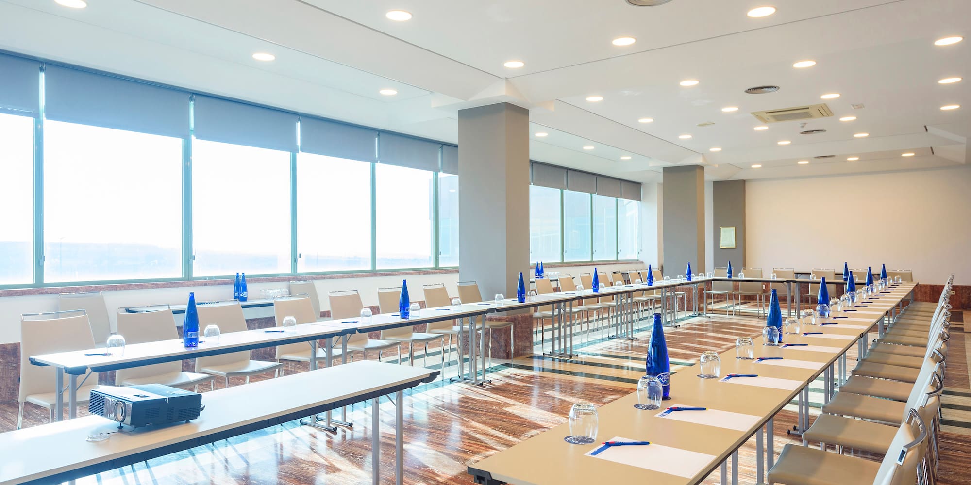 a room with tables and chairs