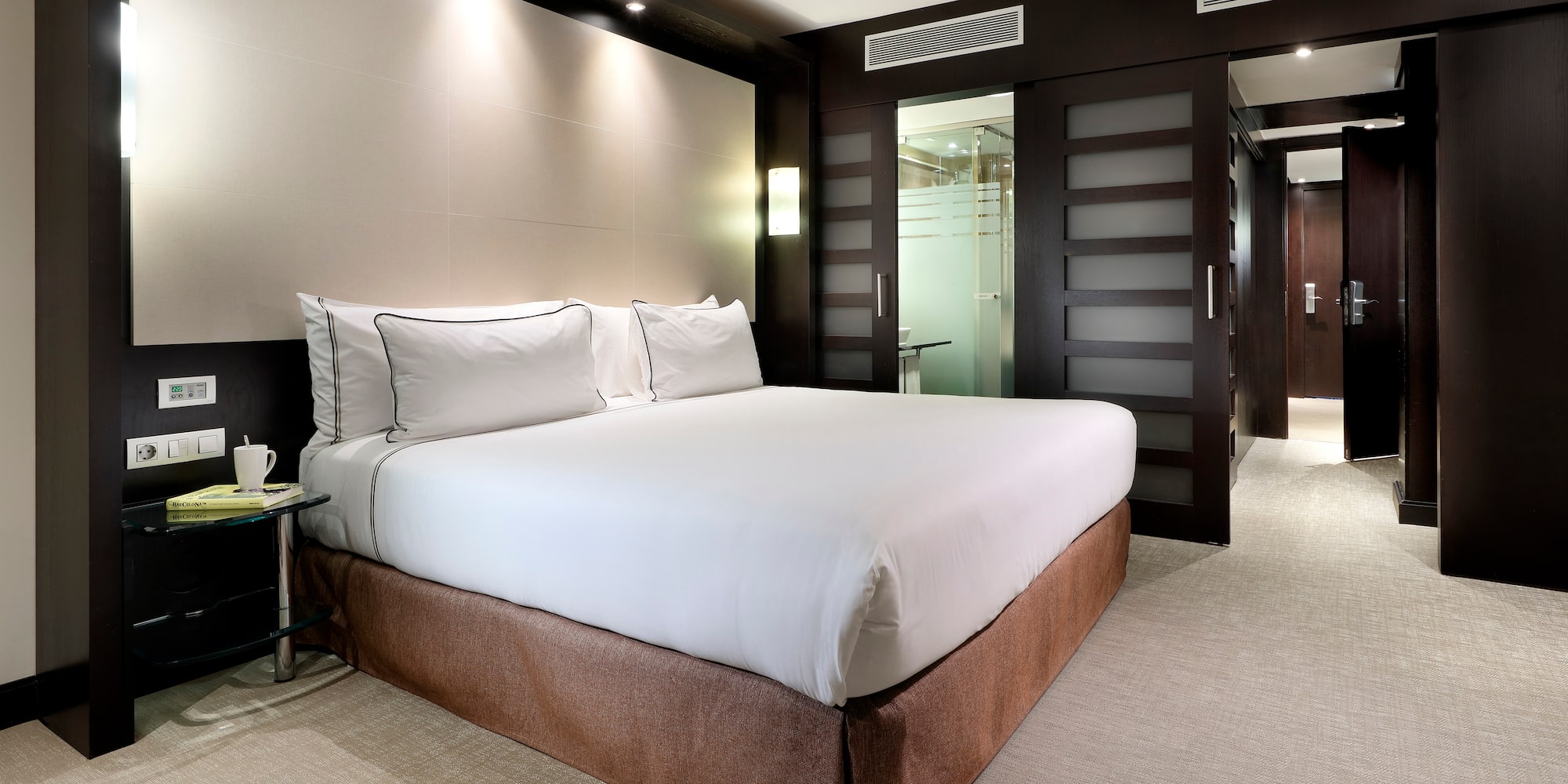 a bed in a hotel room