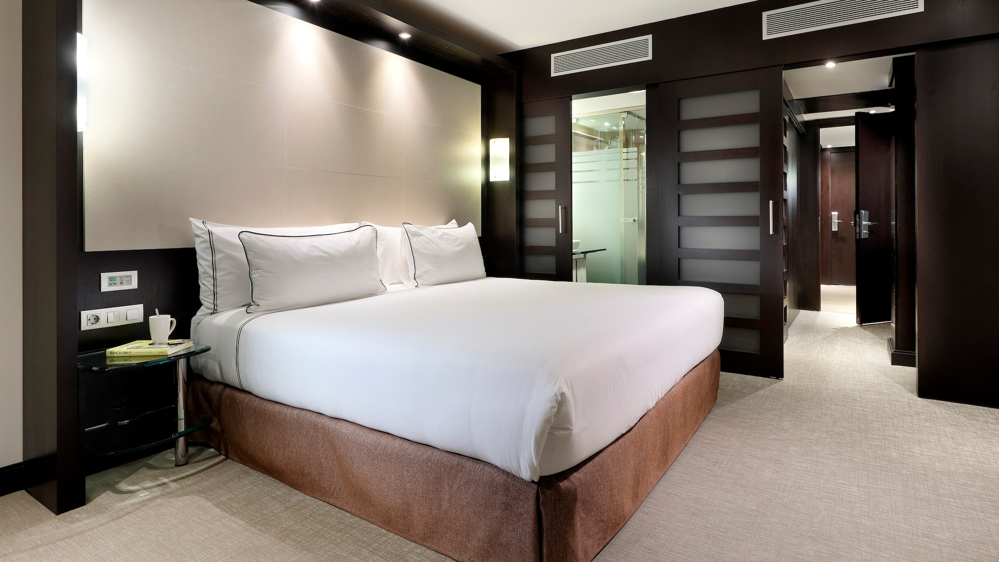 a bed in a hotel room