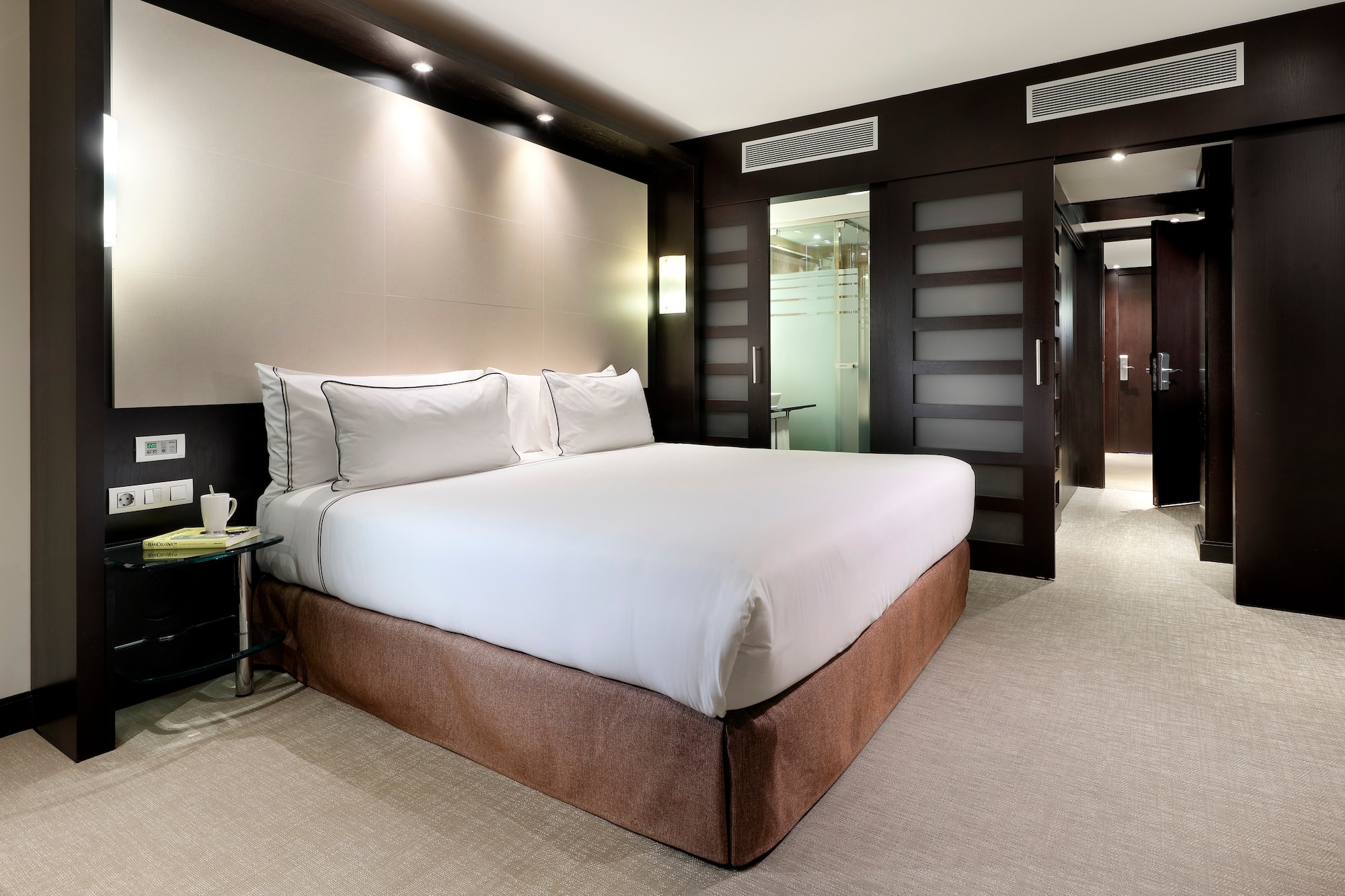 a bed in a hotel room