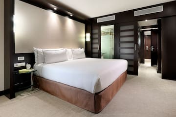 a bed in a hotel room