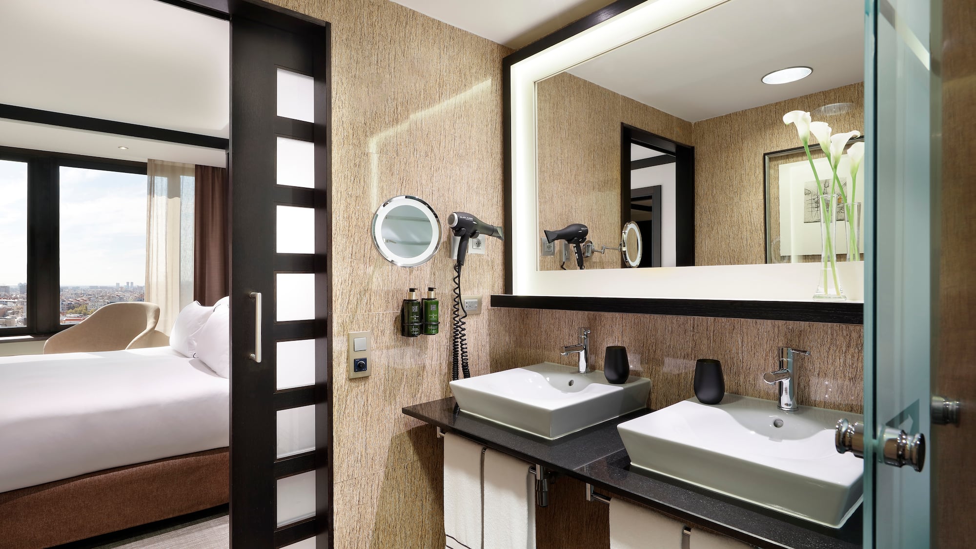 a bathroom with a mirror and sinks