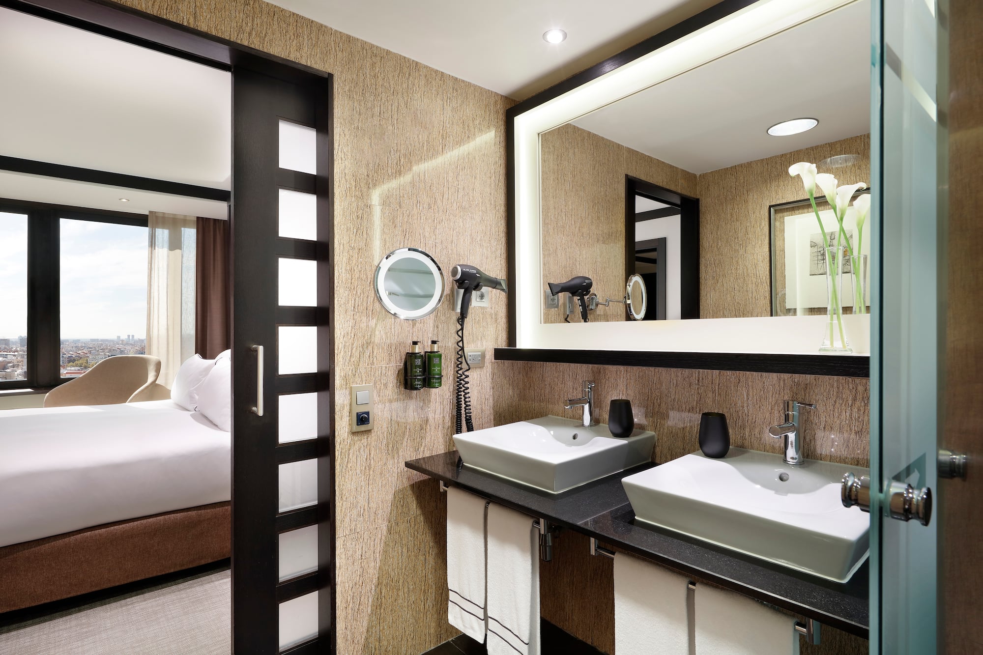 a bathroom with a mirror and sinks