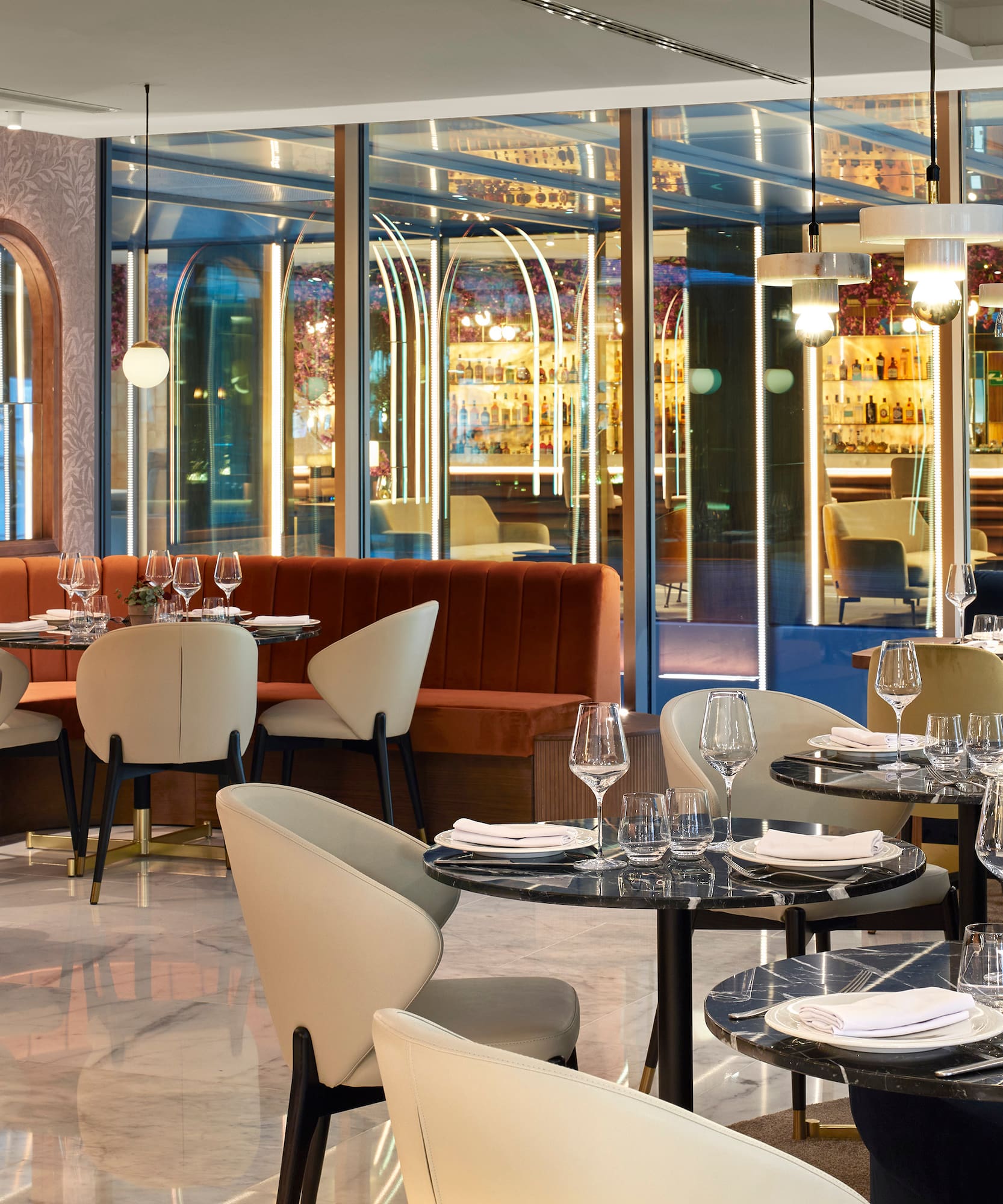 a restaurant with tables and chairs