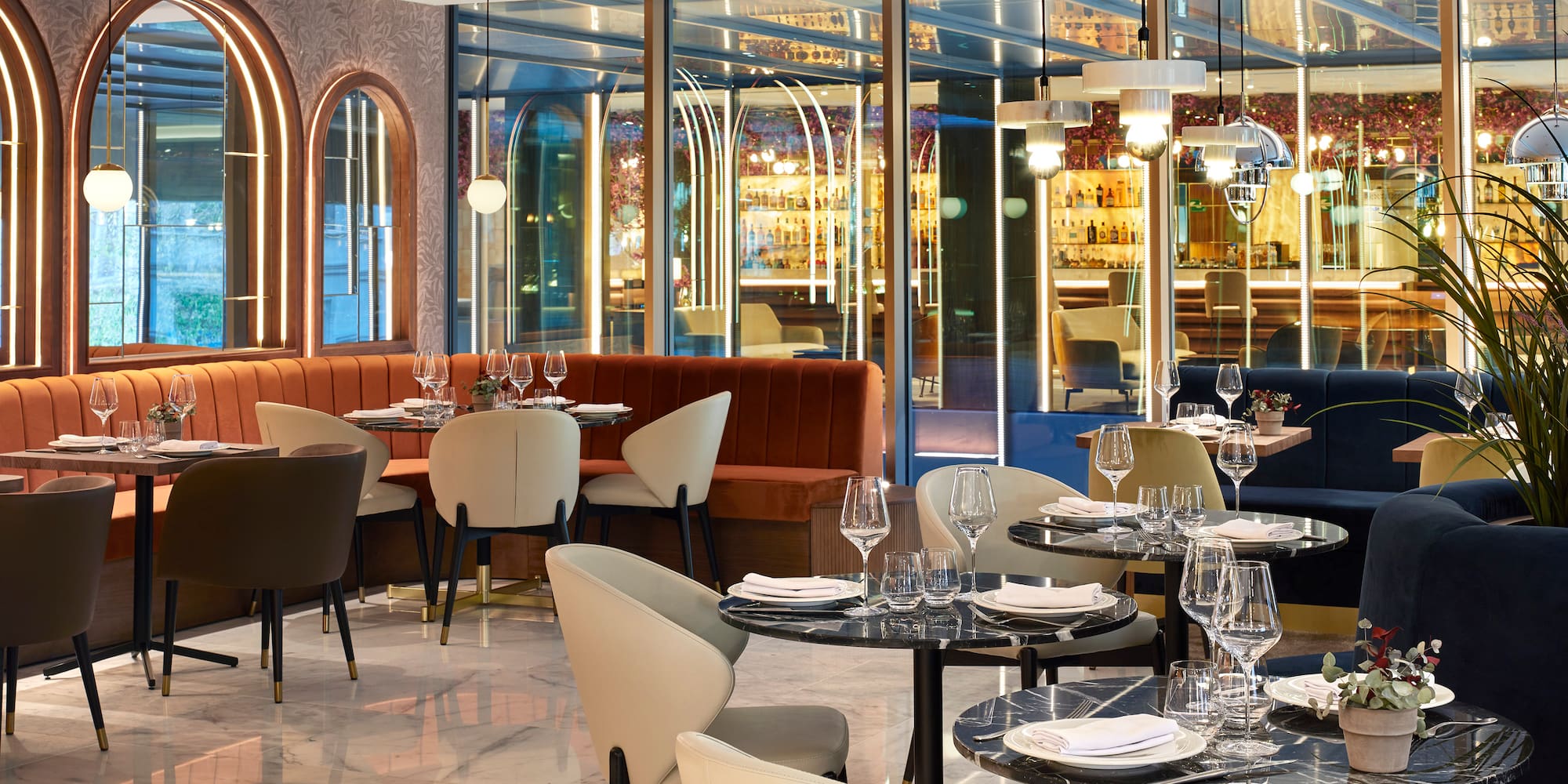 a restaurant with tables and chairs