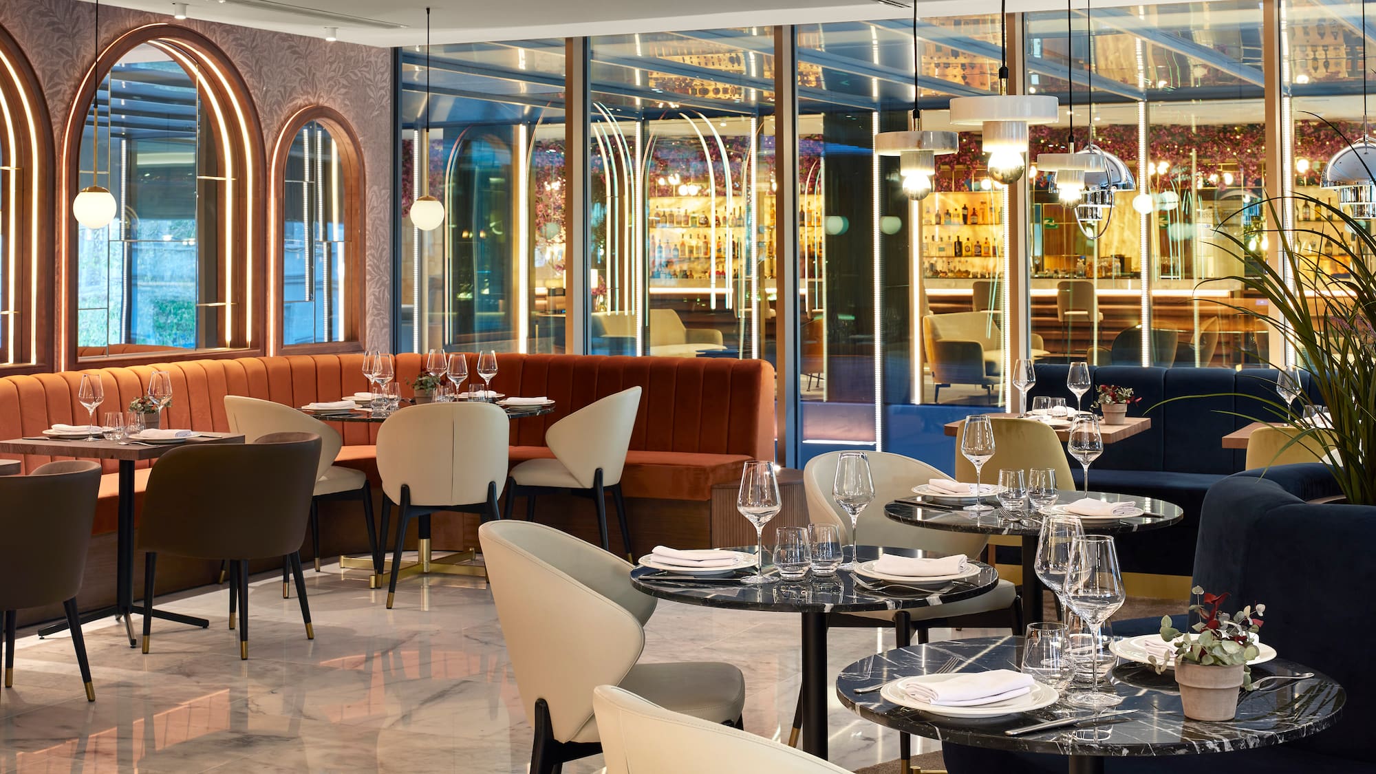 a restaurant with tables and chairs