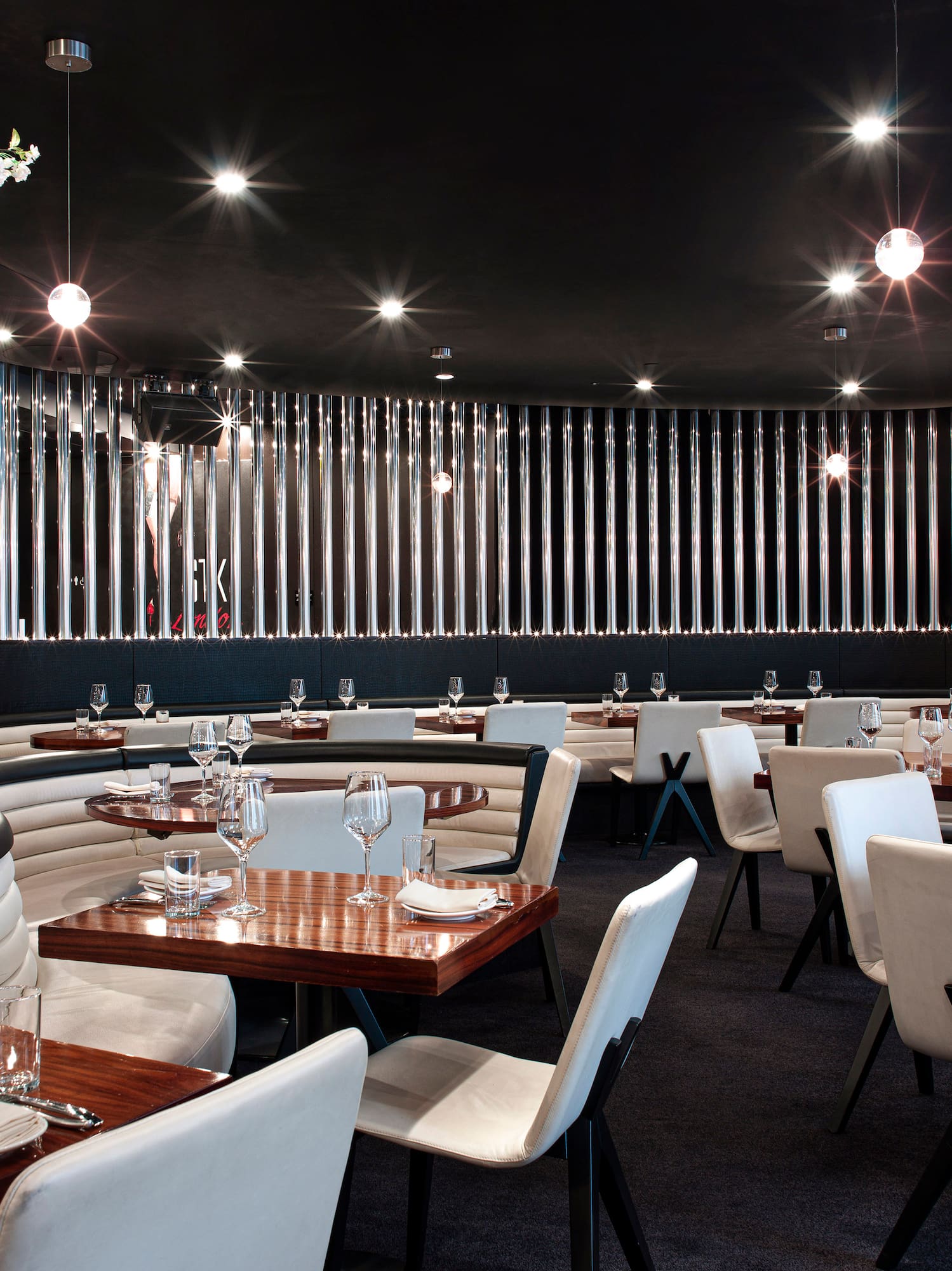 a restaurant with tables and chairs