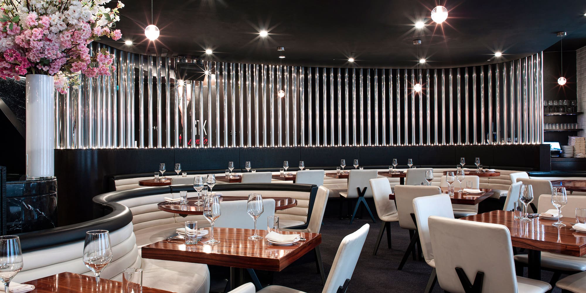 a restaurant with tables and chairs