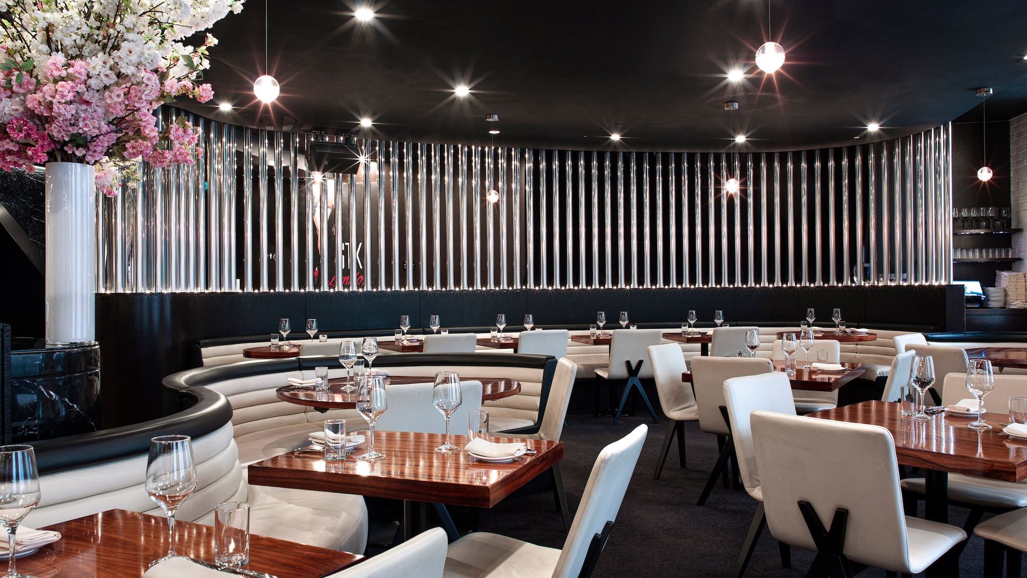 a restaurant with tables and chairs