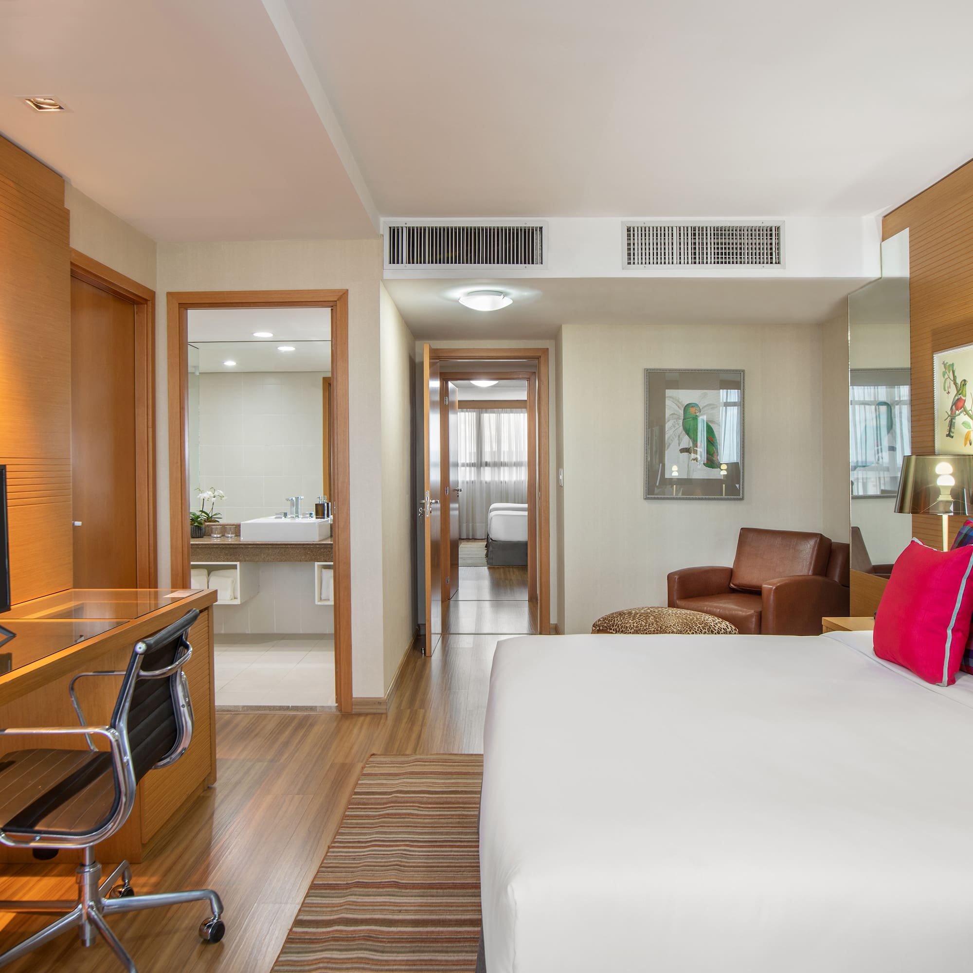 a room with a bed and a desk