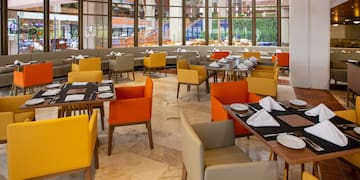 a restaurant with tables and chairs