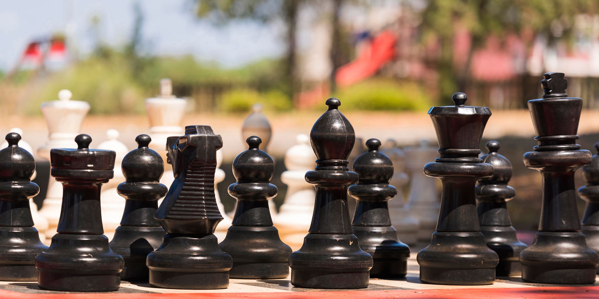 a chess board with black pieces