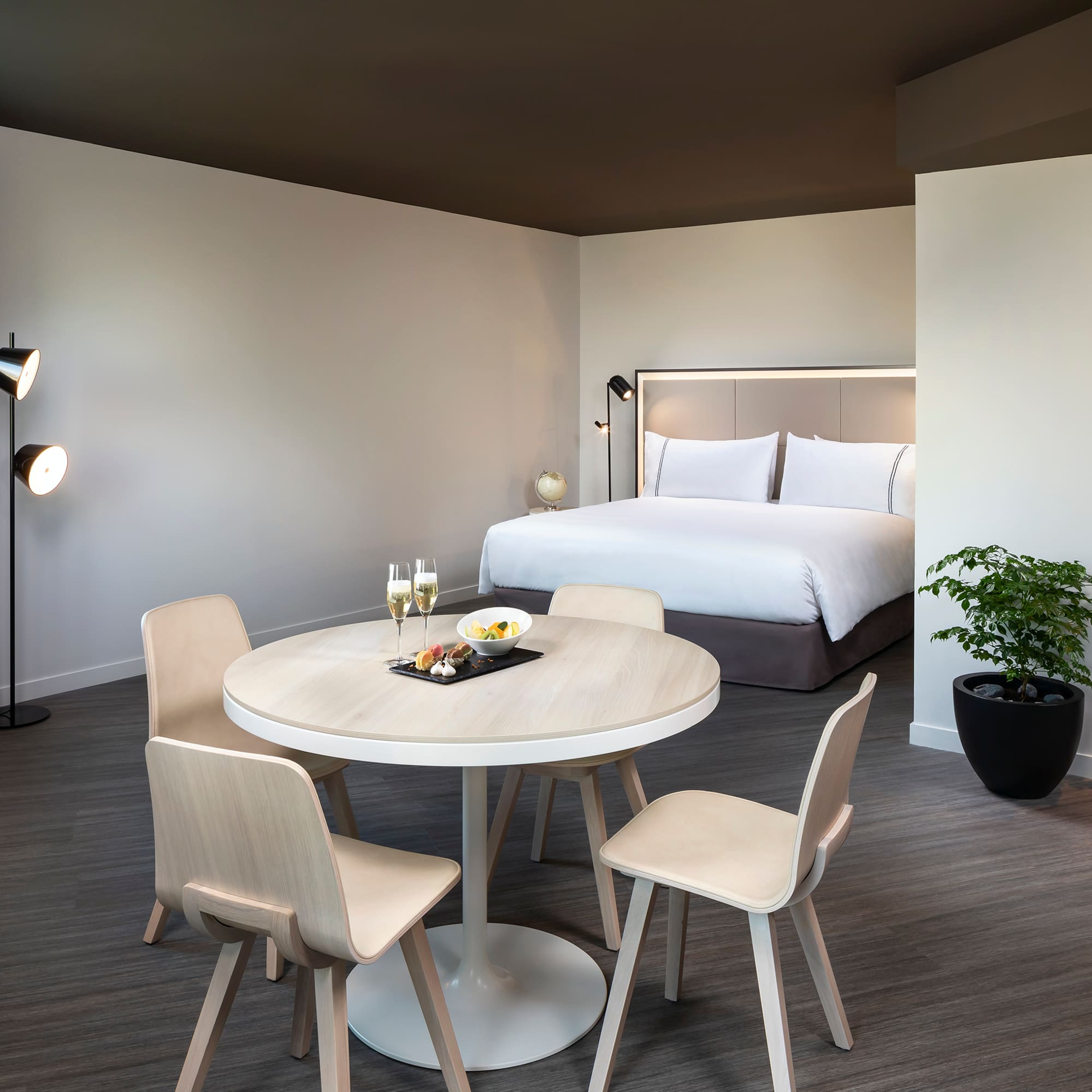 a room with a bed and a table