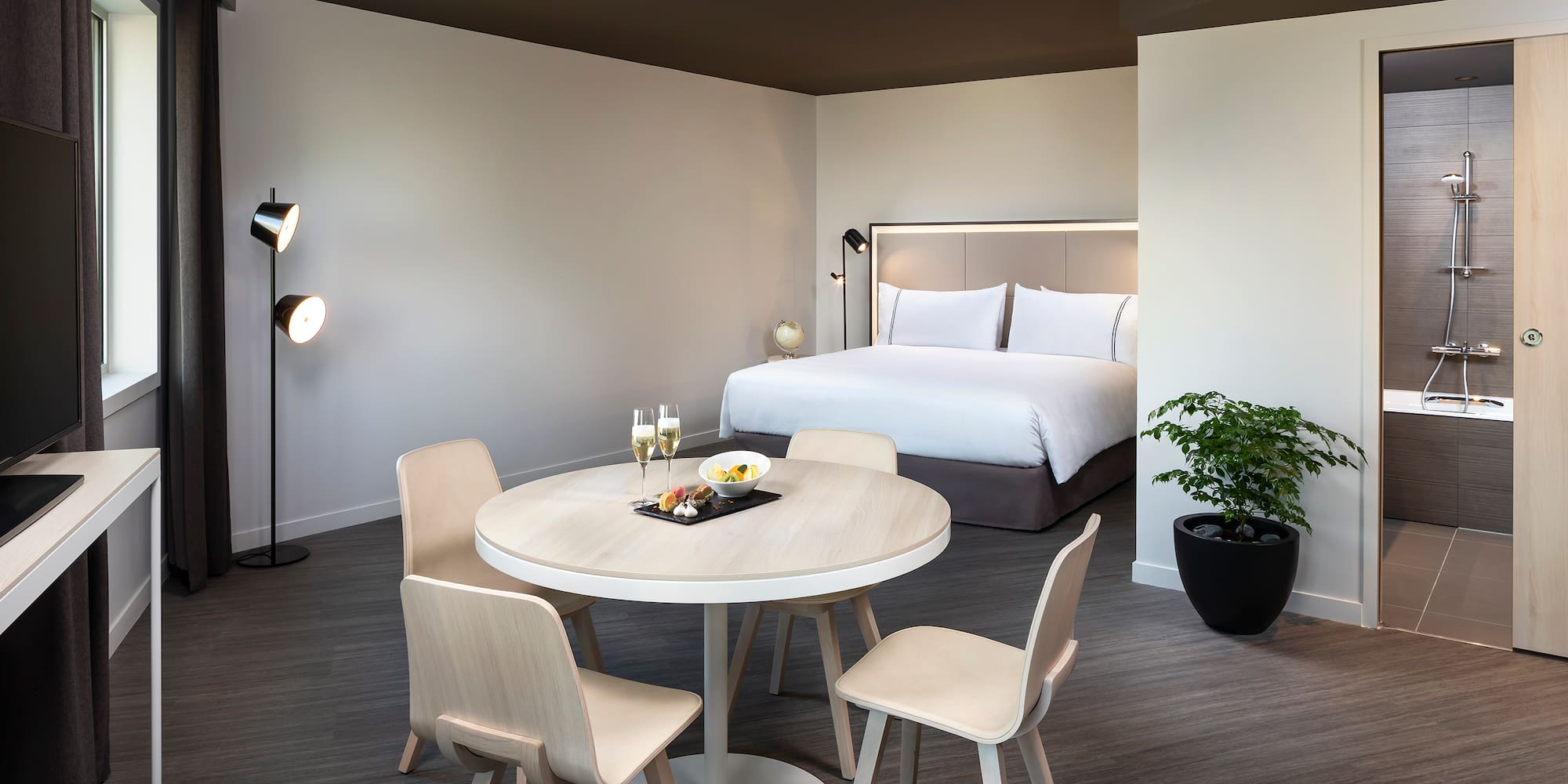 a room with a bed and a table