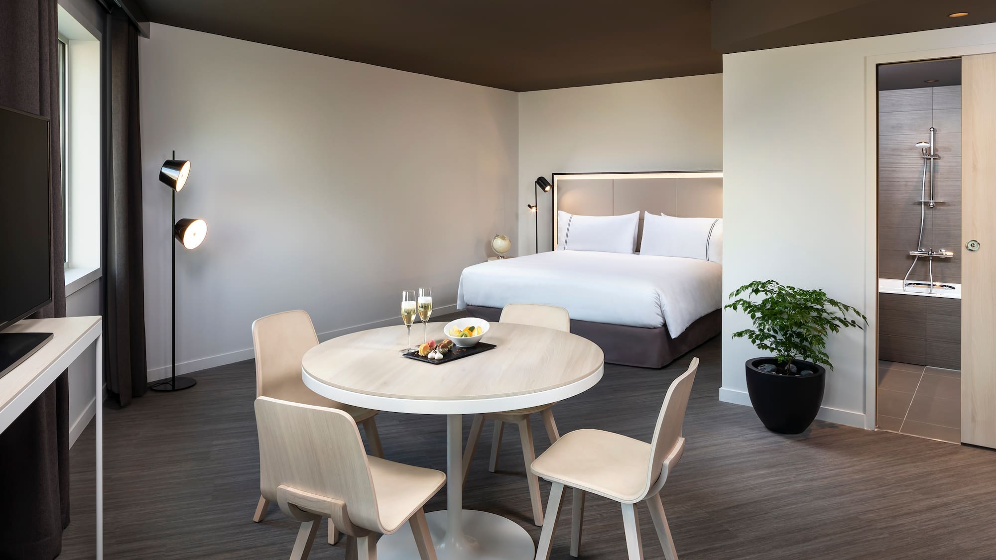 a room with a bed and a table