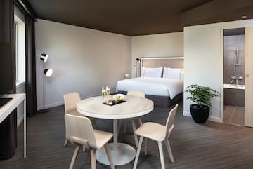 a room with a bed and a table