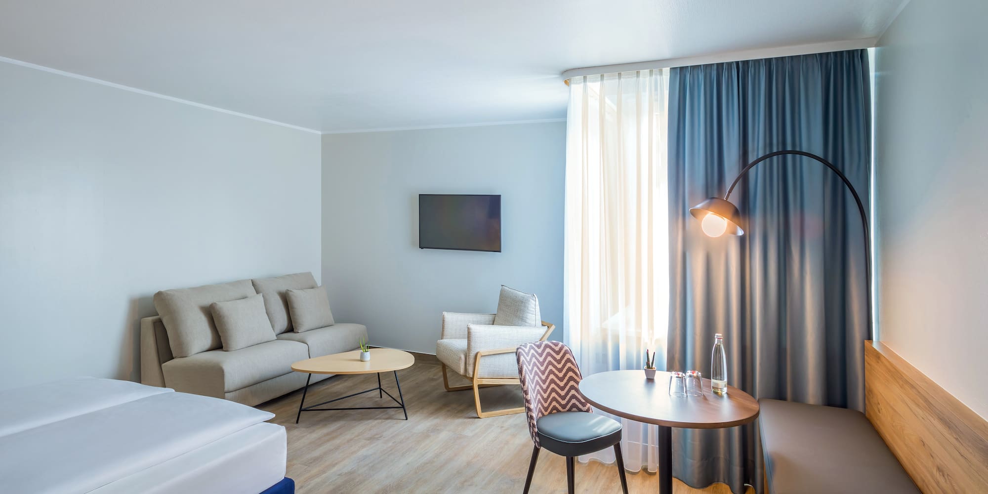 a room with a bed and a couch