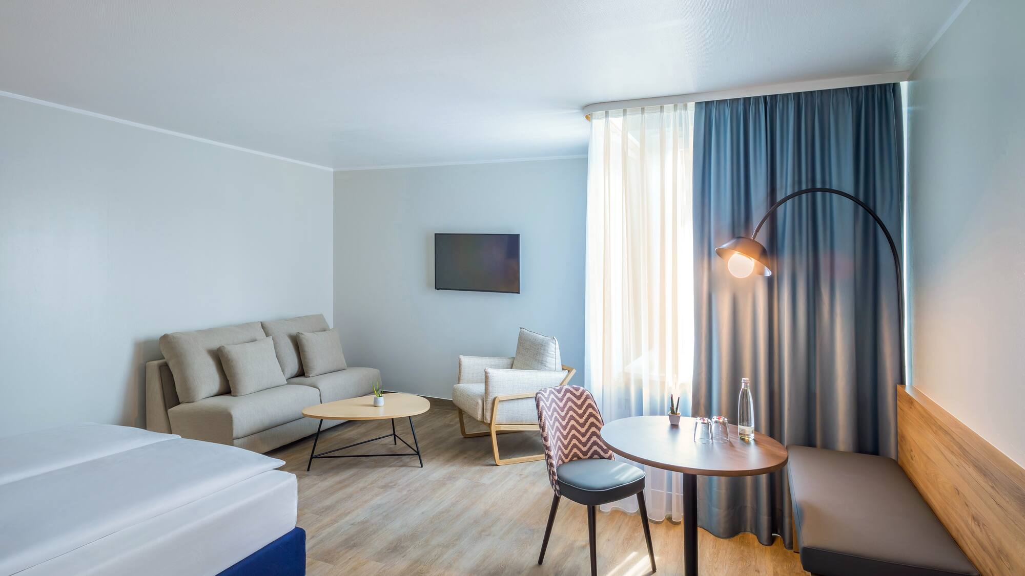 a room with a bed and a couch