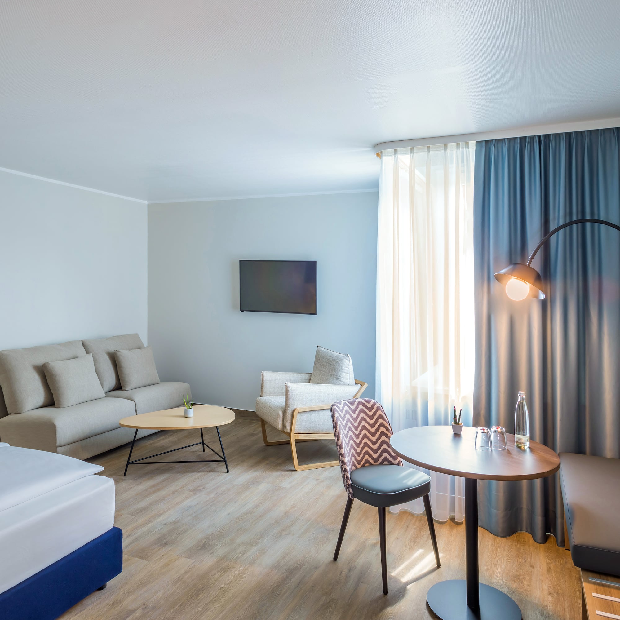 a room with a bed and a couch