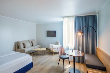 a room with a bed and a couch