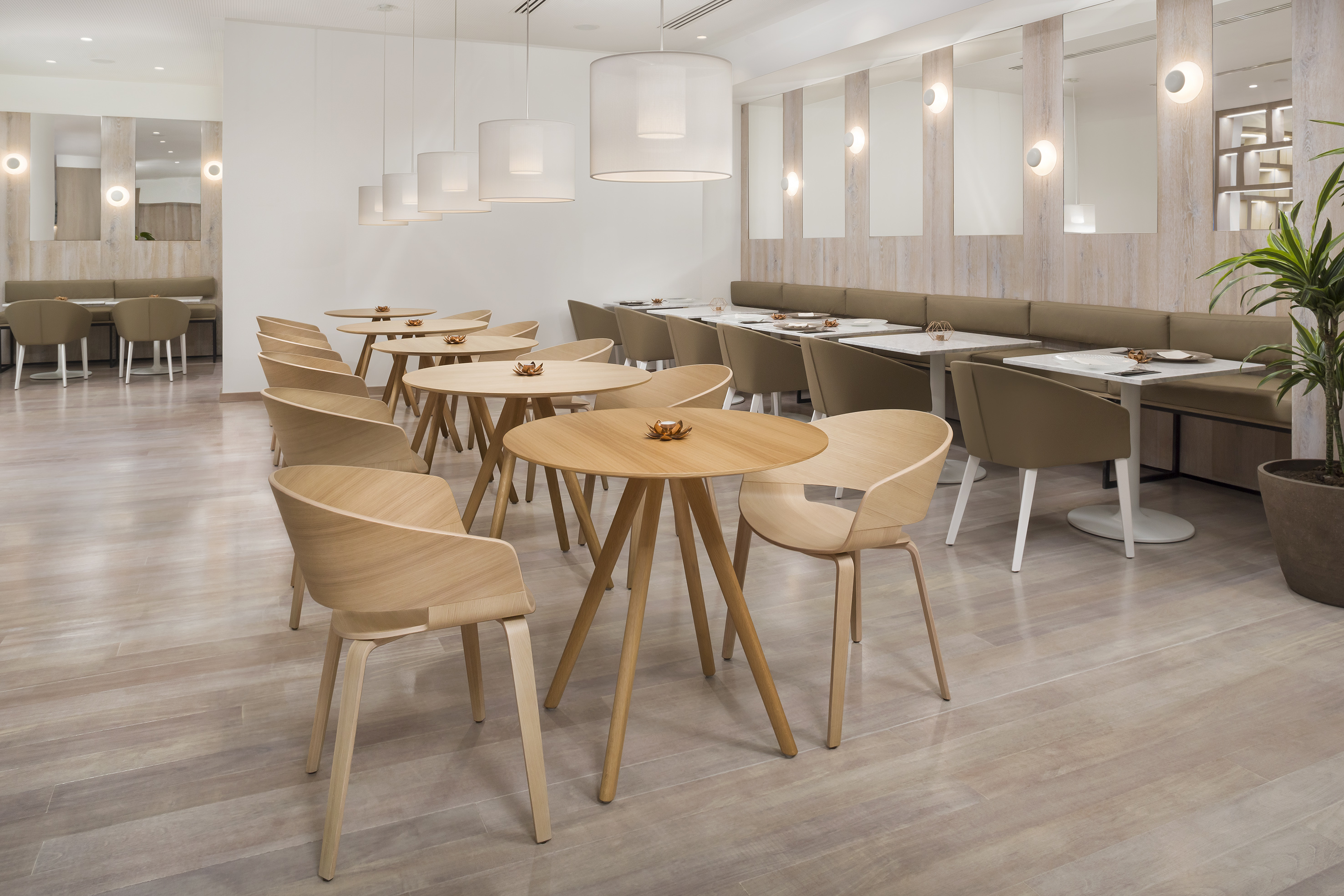 a room with tables and chairs