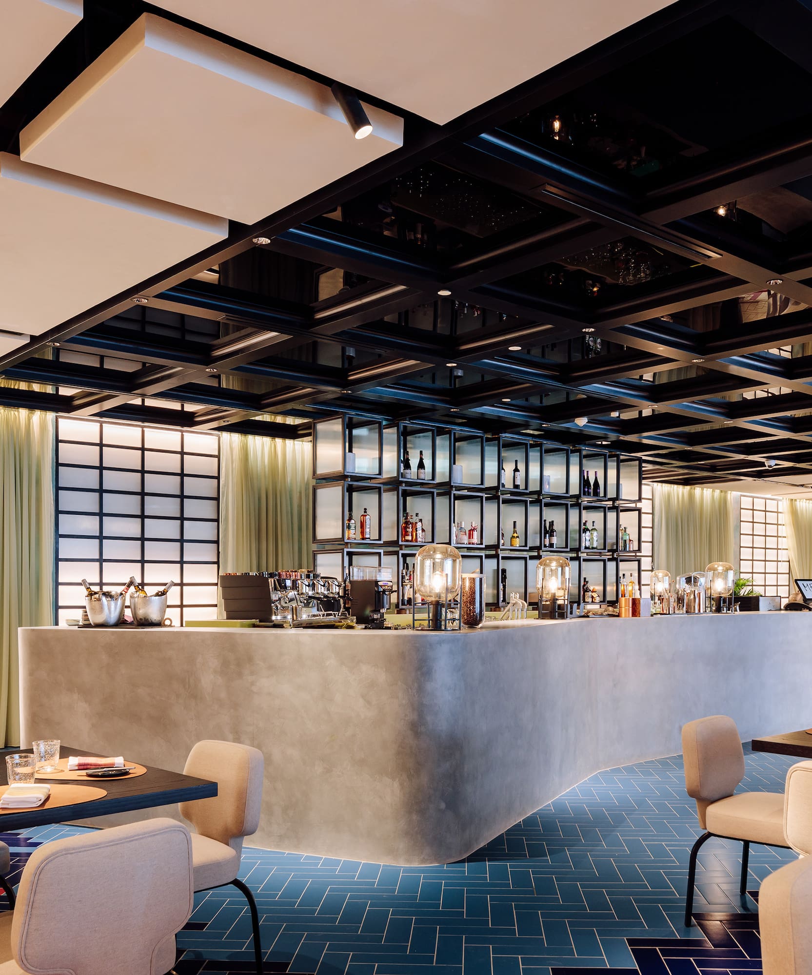 a restaurant with tables and chairs