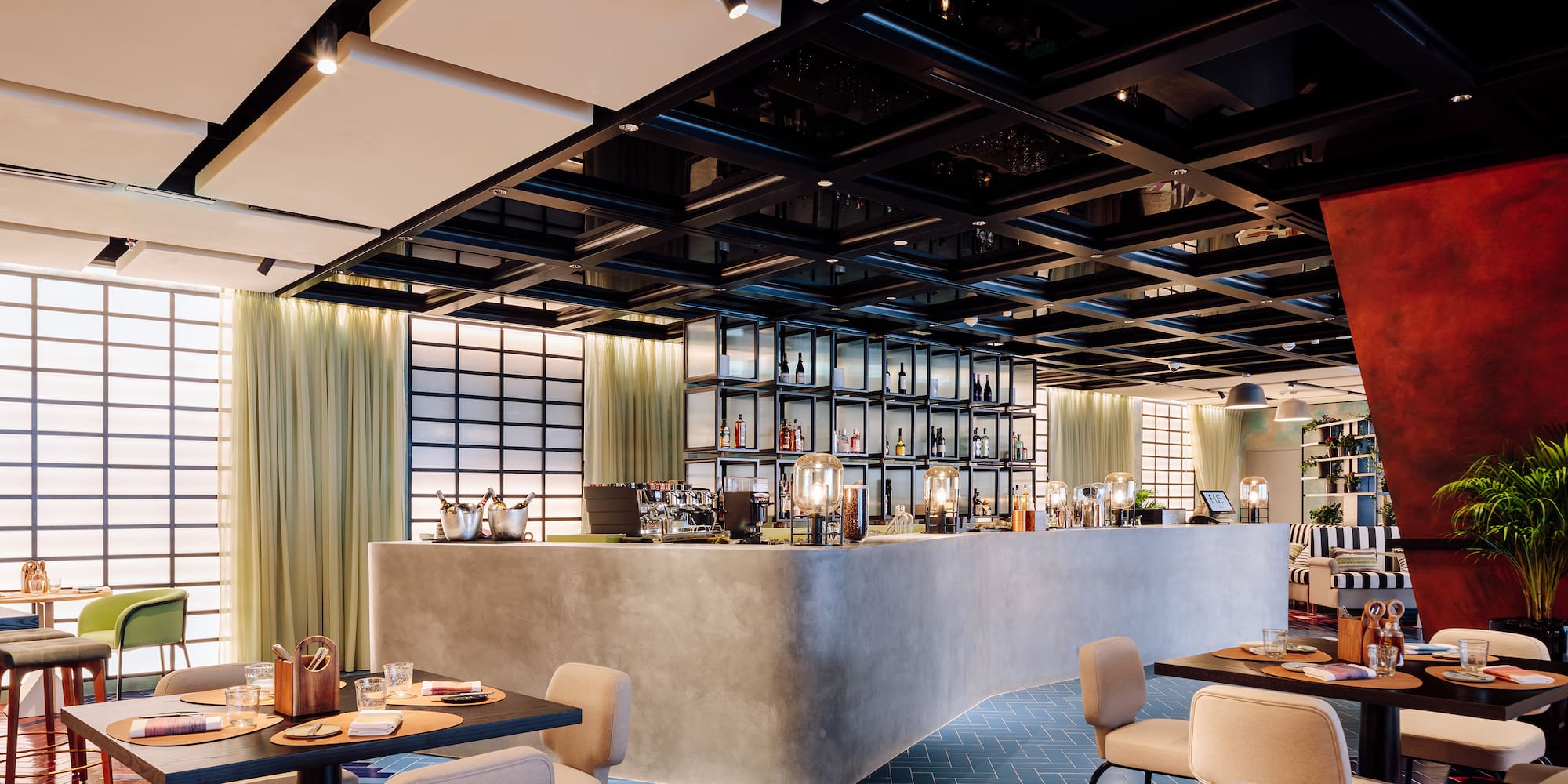 a restaurant with tables and chairs