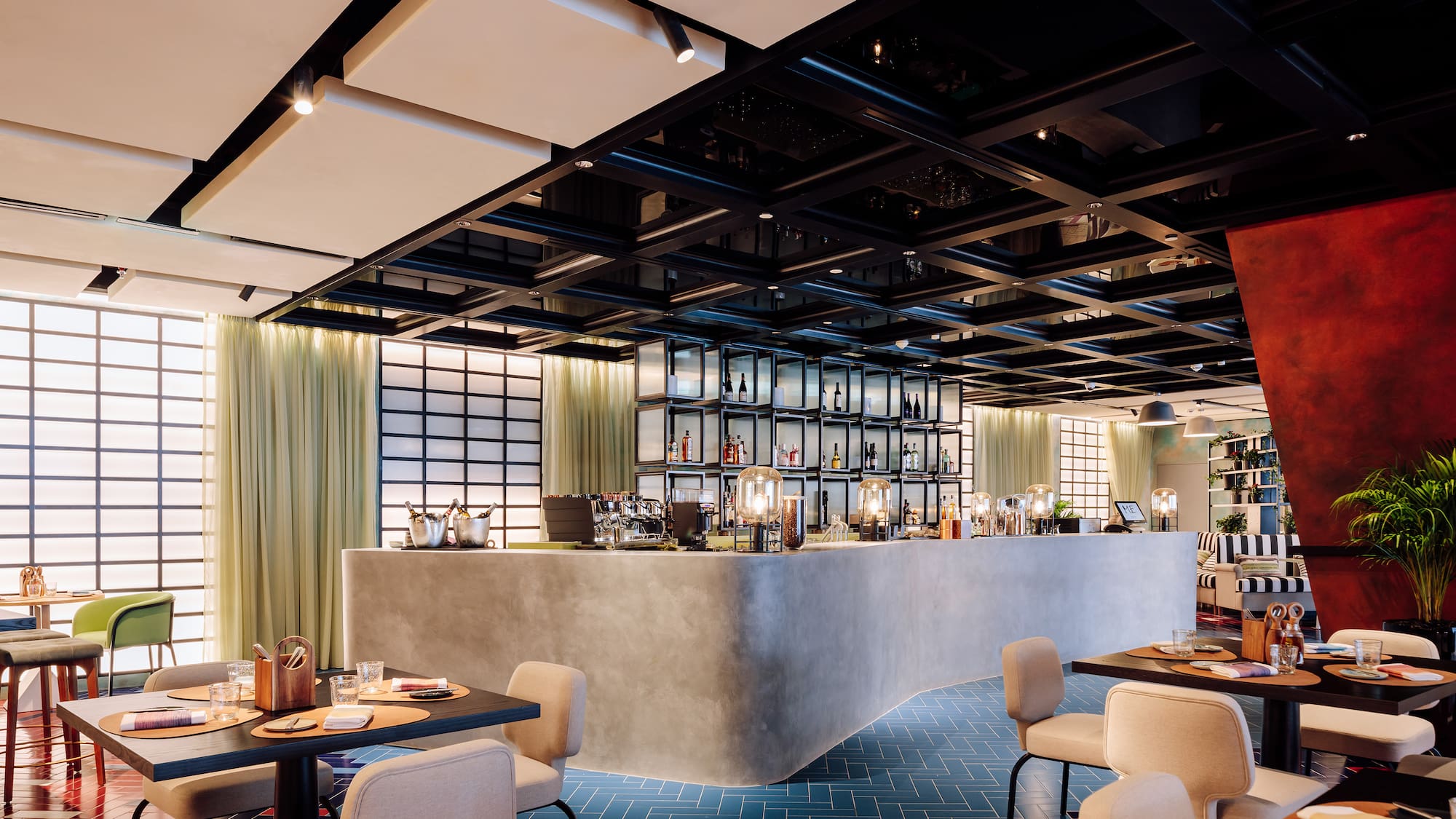 a restaurant with tables and chairs