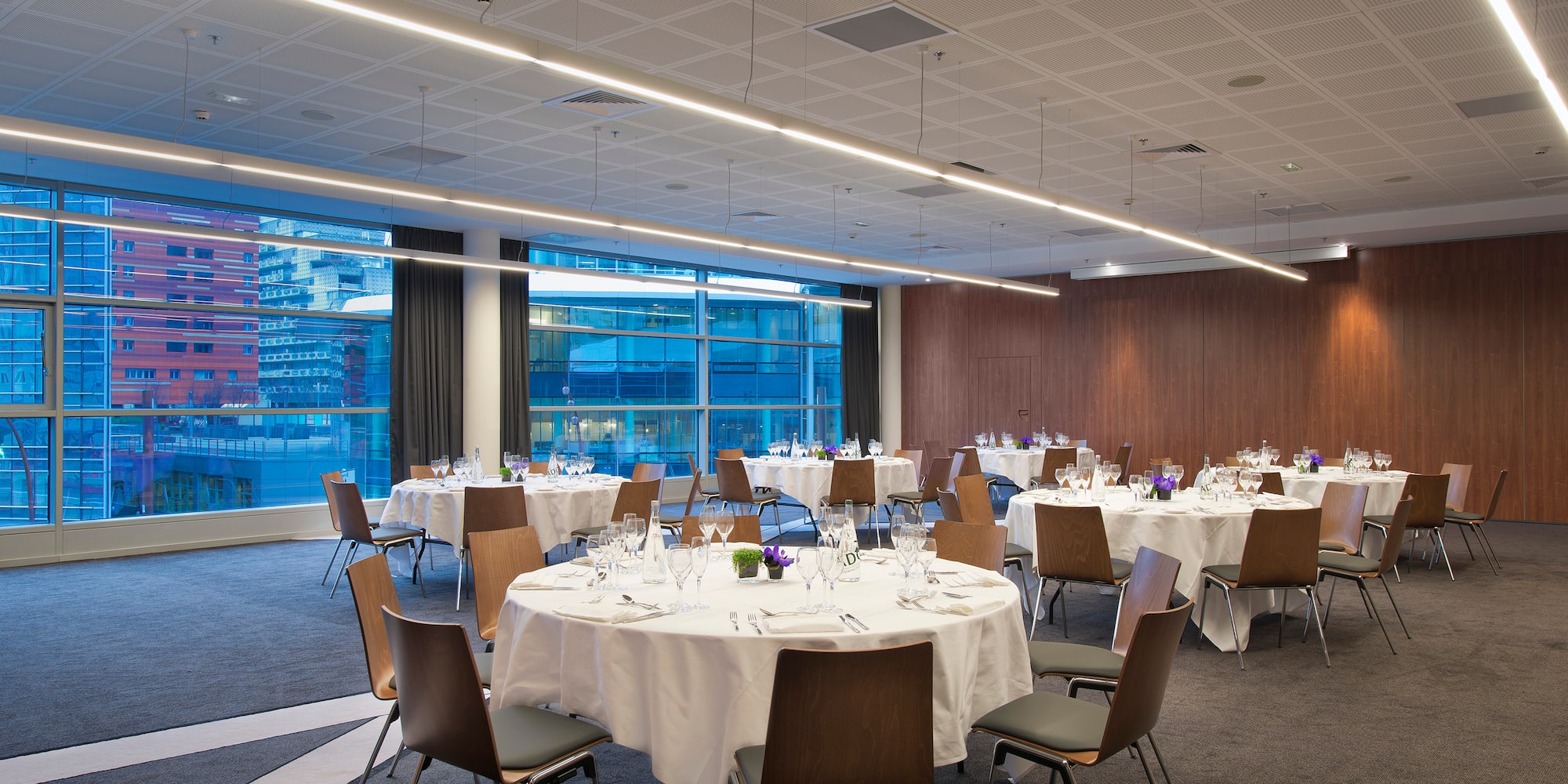 a room with tables and chairs