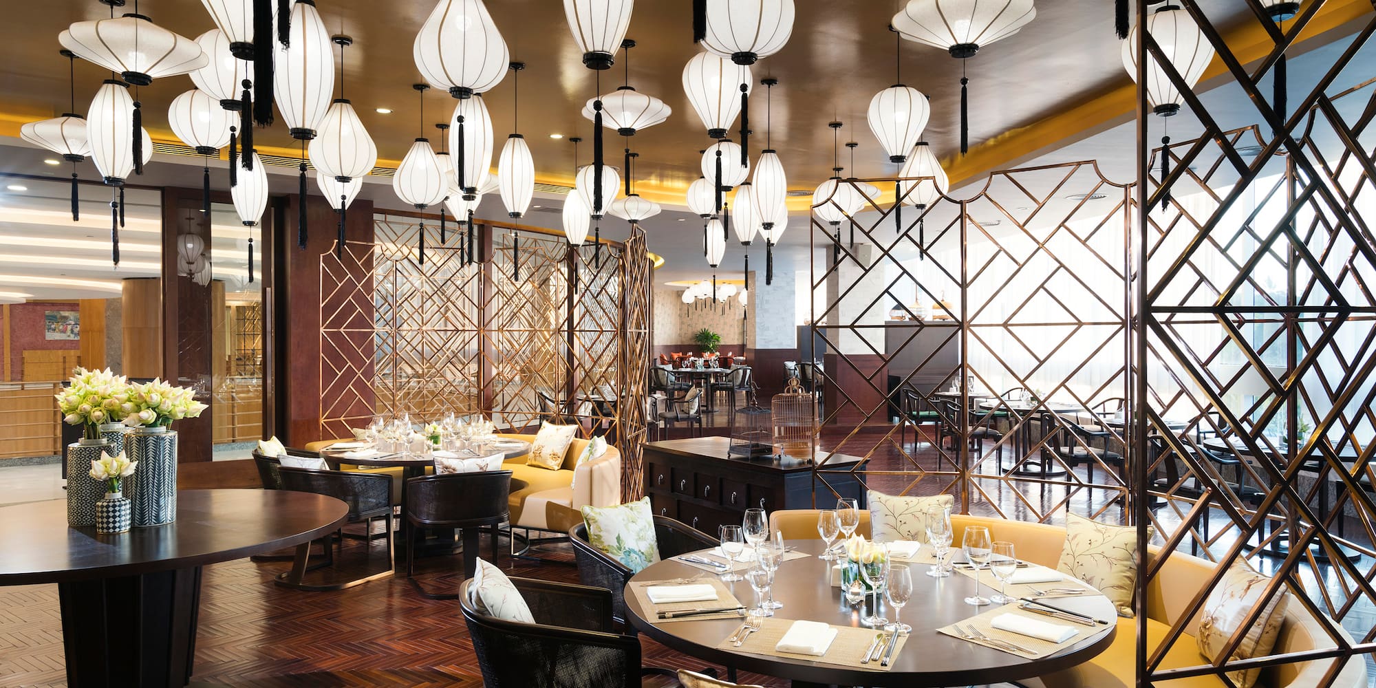 a restaurant with tables and chairs