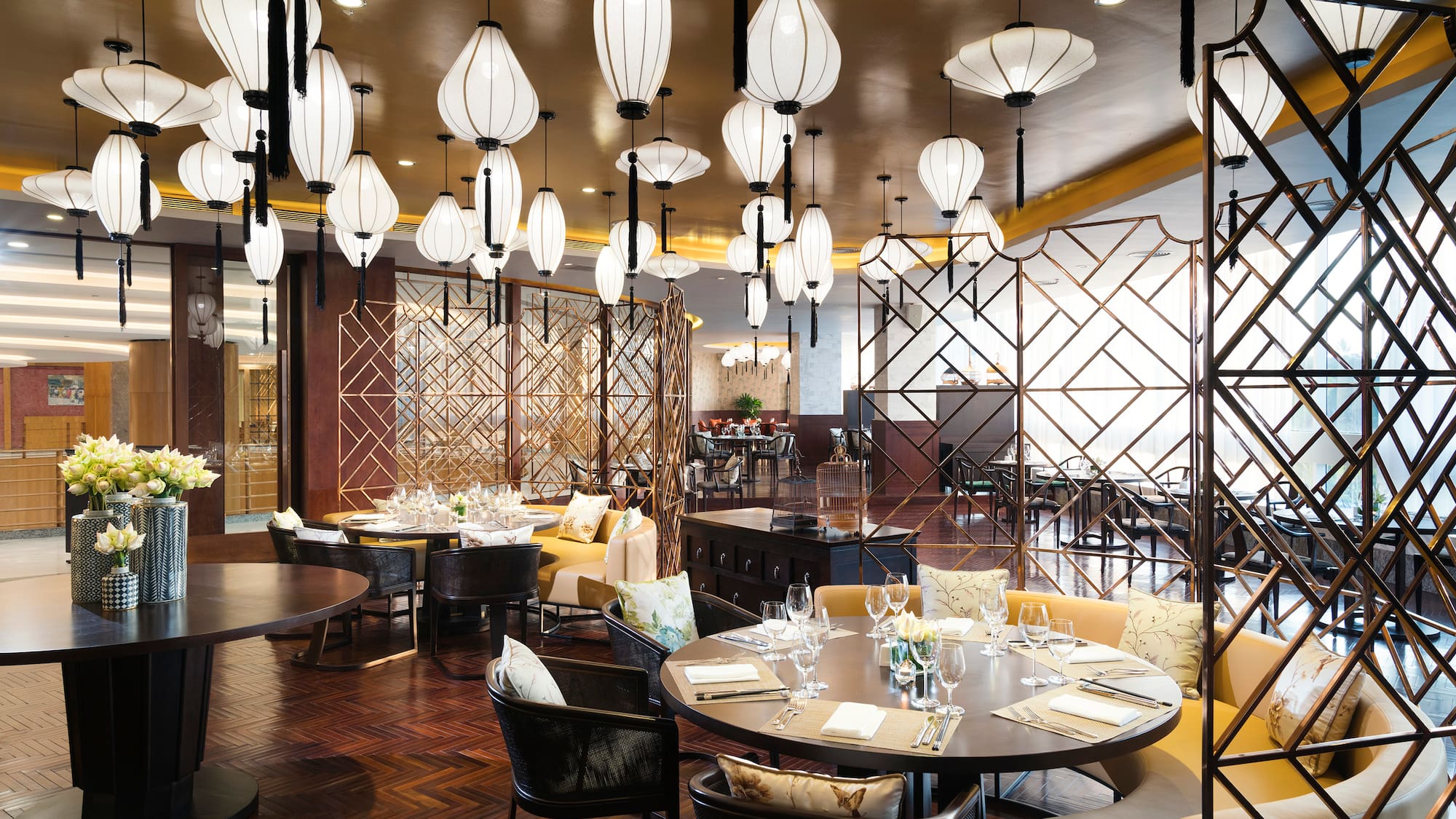 a restaurant with tables and chairs