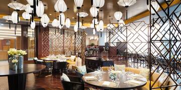 a restaurant with tables and chairs