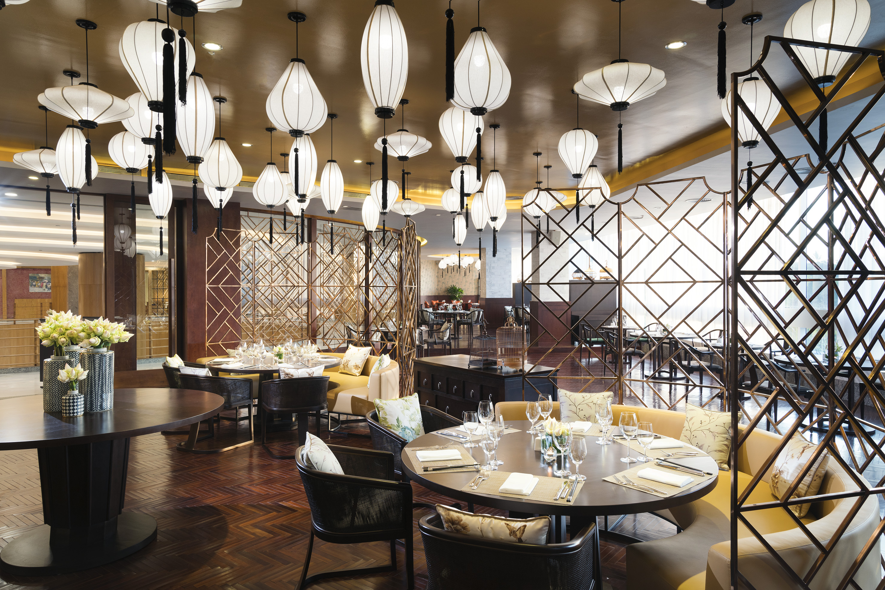 a restaurant with tables and chairs