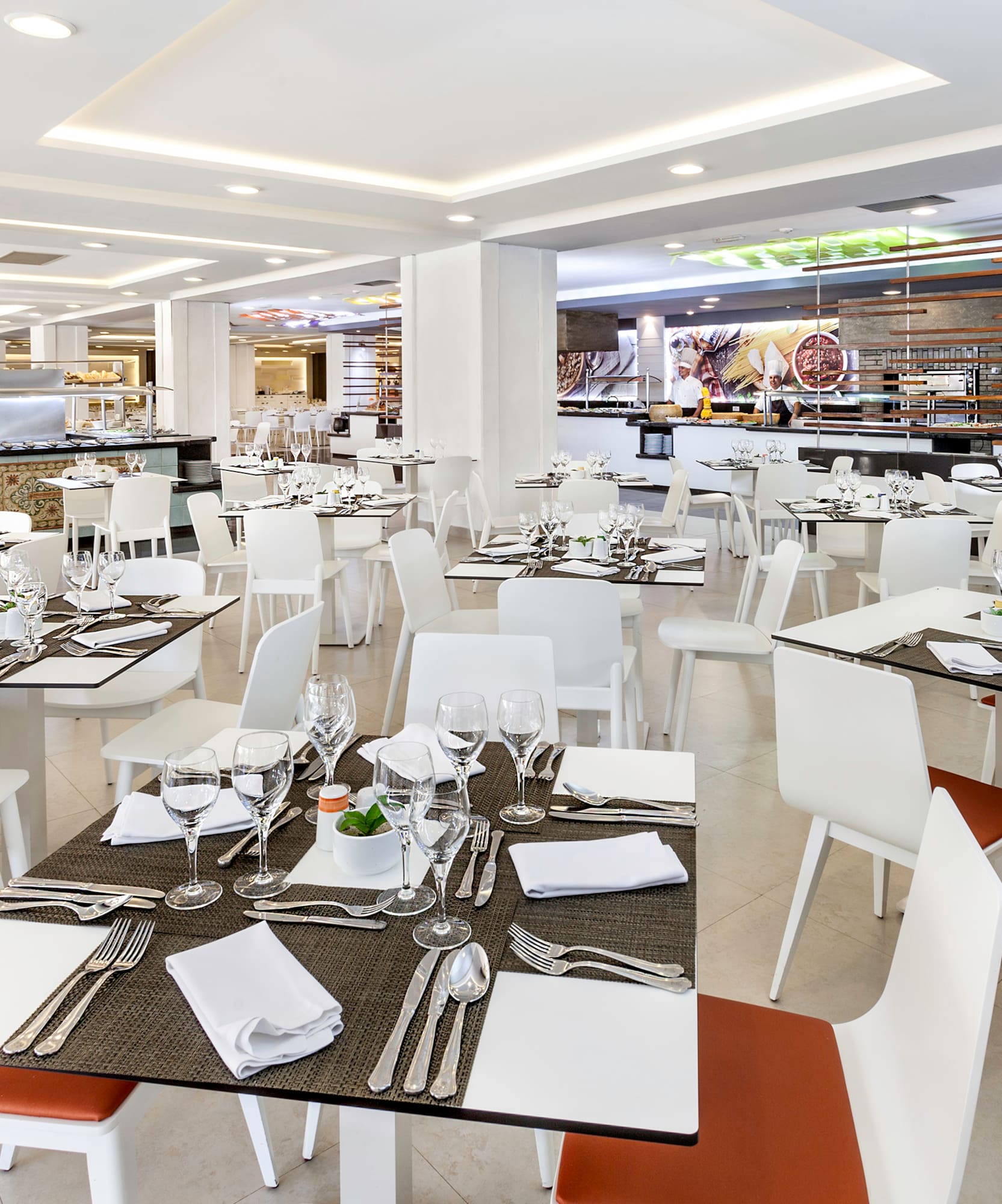 a large room with tables and chairs