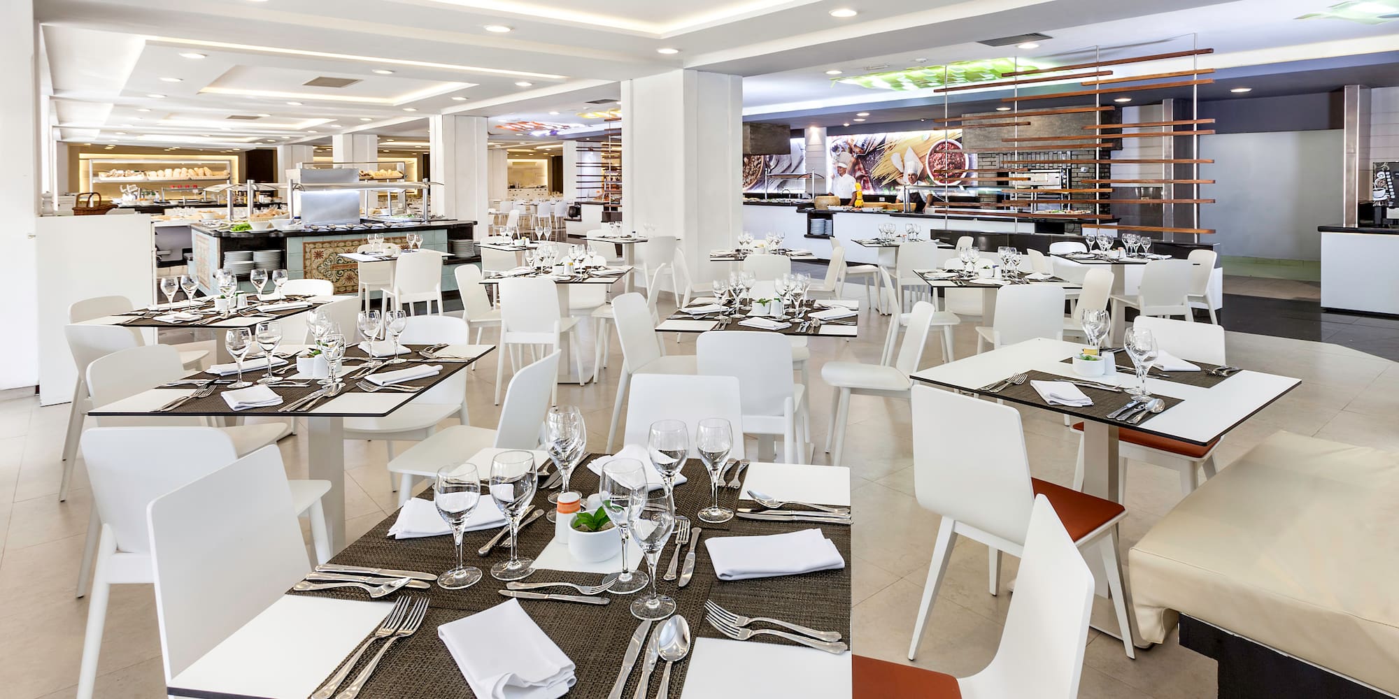 a large room with tables and chairs