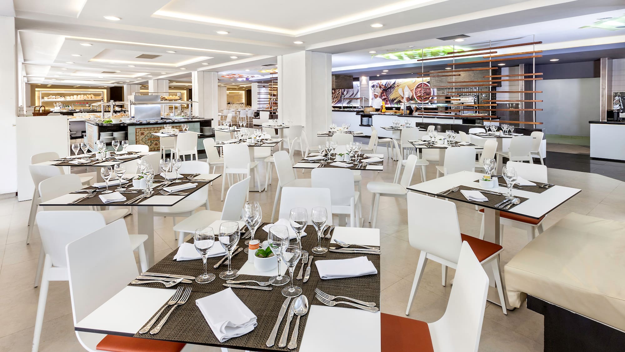 a large room with tables and chairs