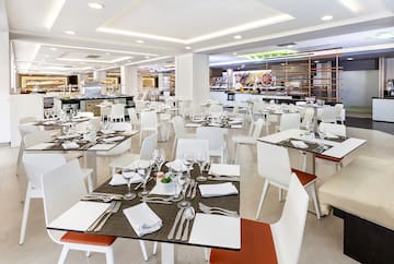 a large room with tables and chairs