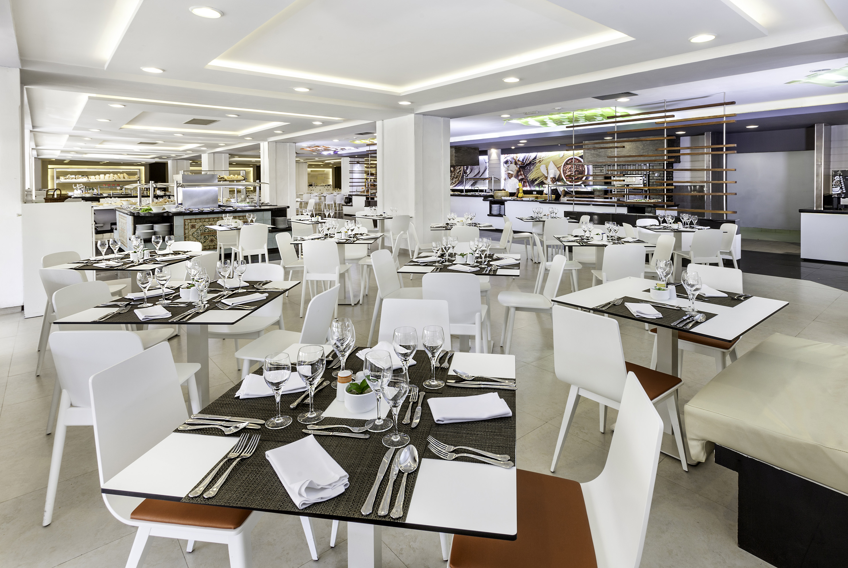 a large room with tables and chairs